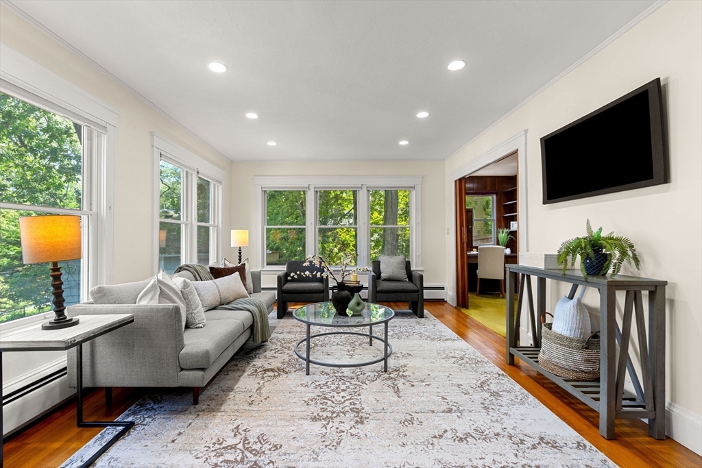 36 Independence Avenue Lexington, MA 02420 - Photo 6 of 33 a living room with furniture and a flat screen tv