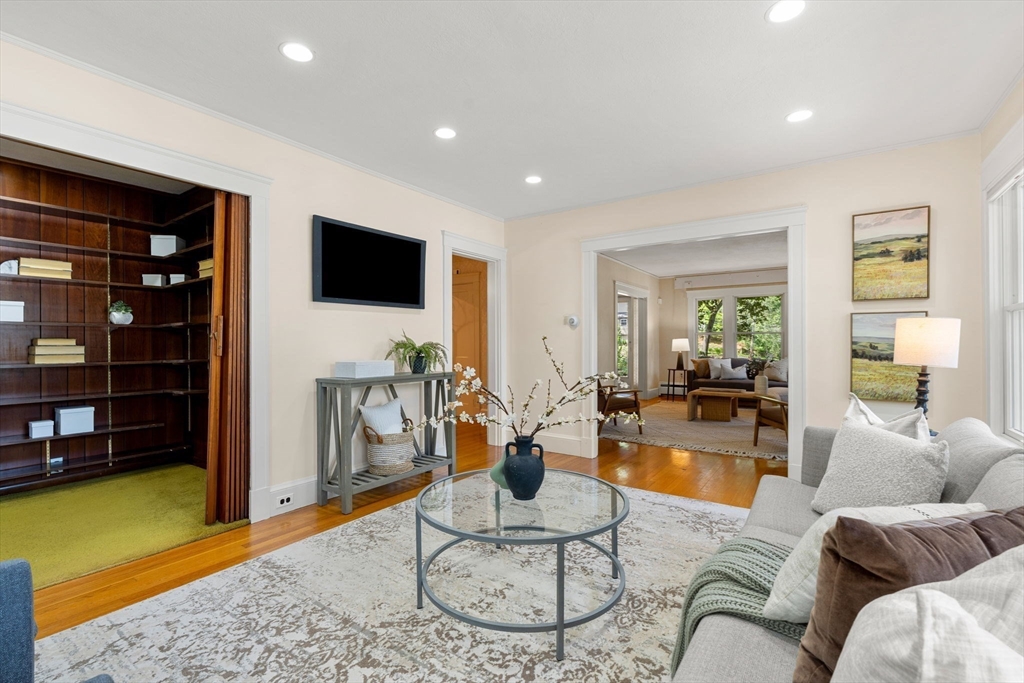 36 Independence Avenue Lexington, MA 02420 - Photo 8 of 33 a living room with furniture and a flat screen tv