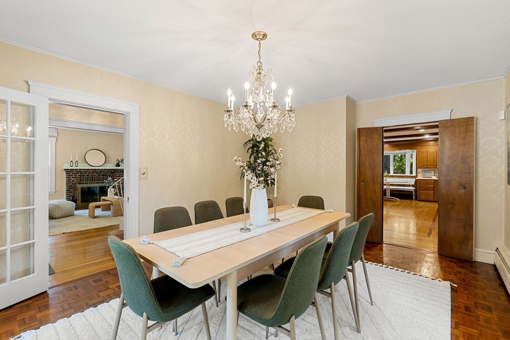 36 Independence Avenue Lexington, MA 02420 - Photo 10 of 33 a view of a dining room with furniture and wooden floor