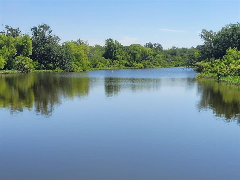 107 County Road 107 Cisco, TX 76437 - Photo 2 of 40 a view of a lake with a city view
