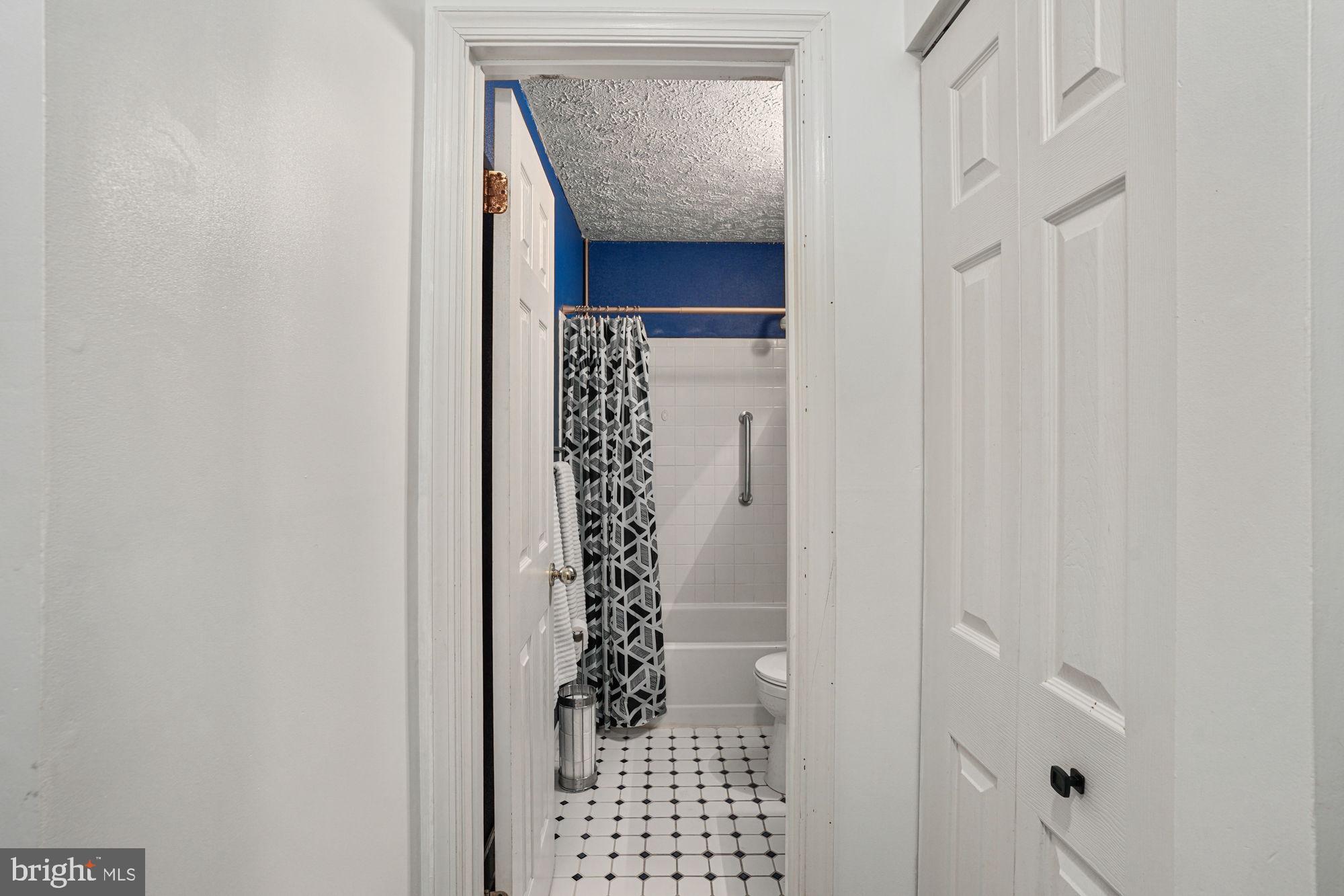 38 Buck Road Stafford, VA 22556 - Photo 16 of 39 a bathroom with a shower and a sink