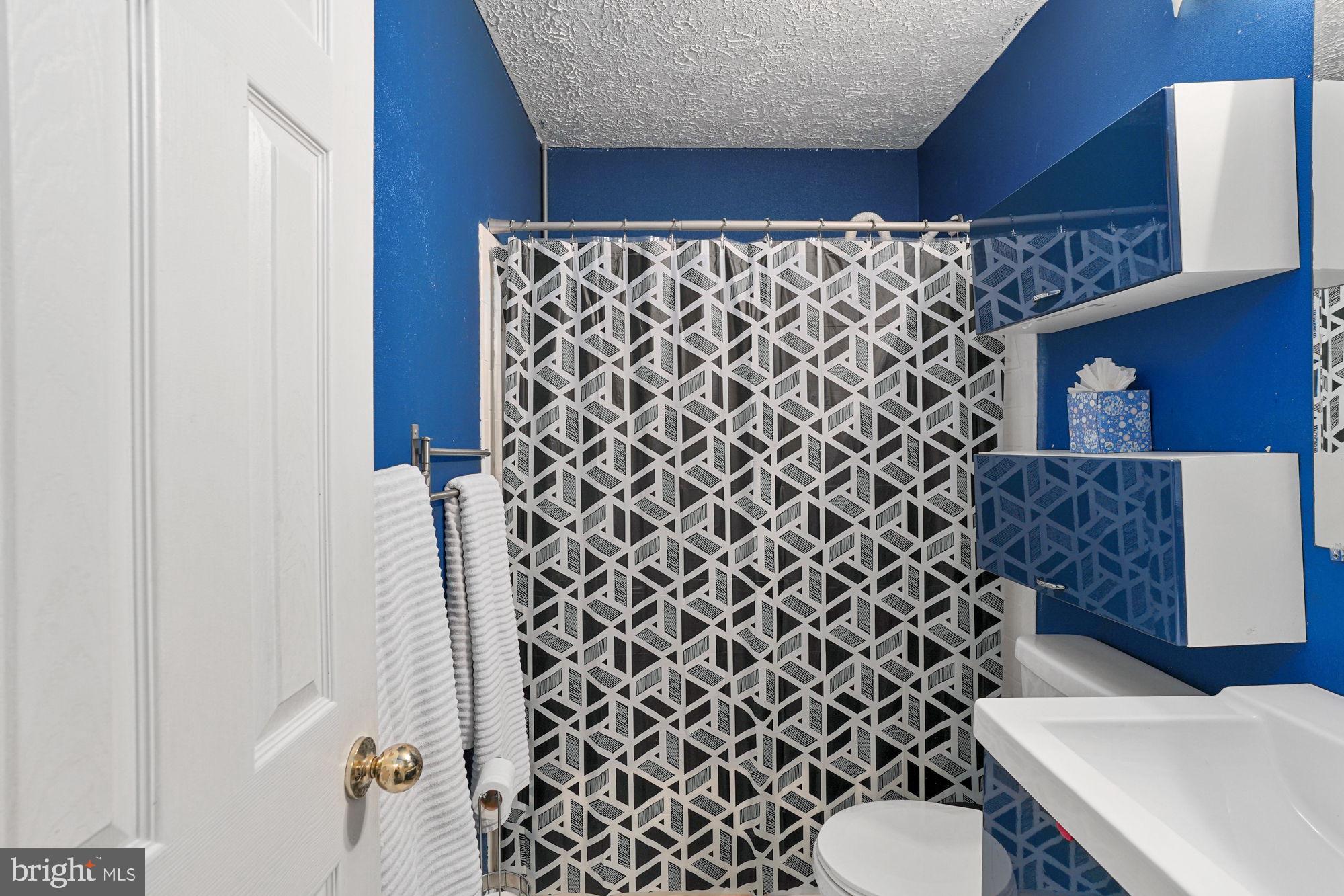 38 Buck Road Stafford, VA 22556 - Photo 17 of 39 a bathroom with a sink and a mirror