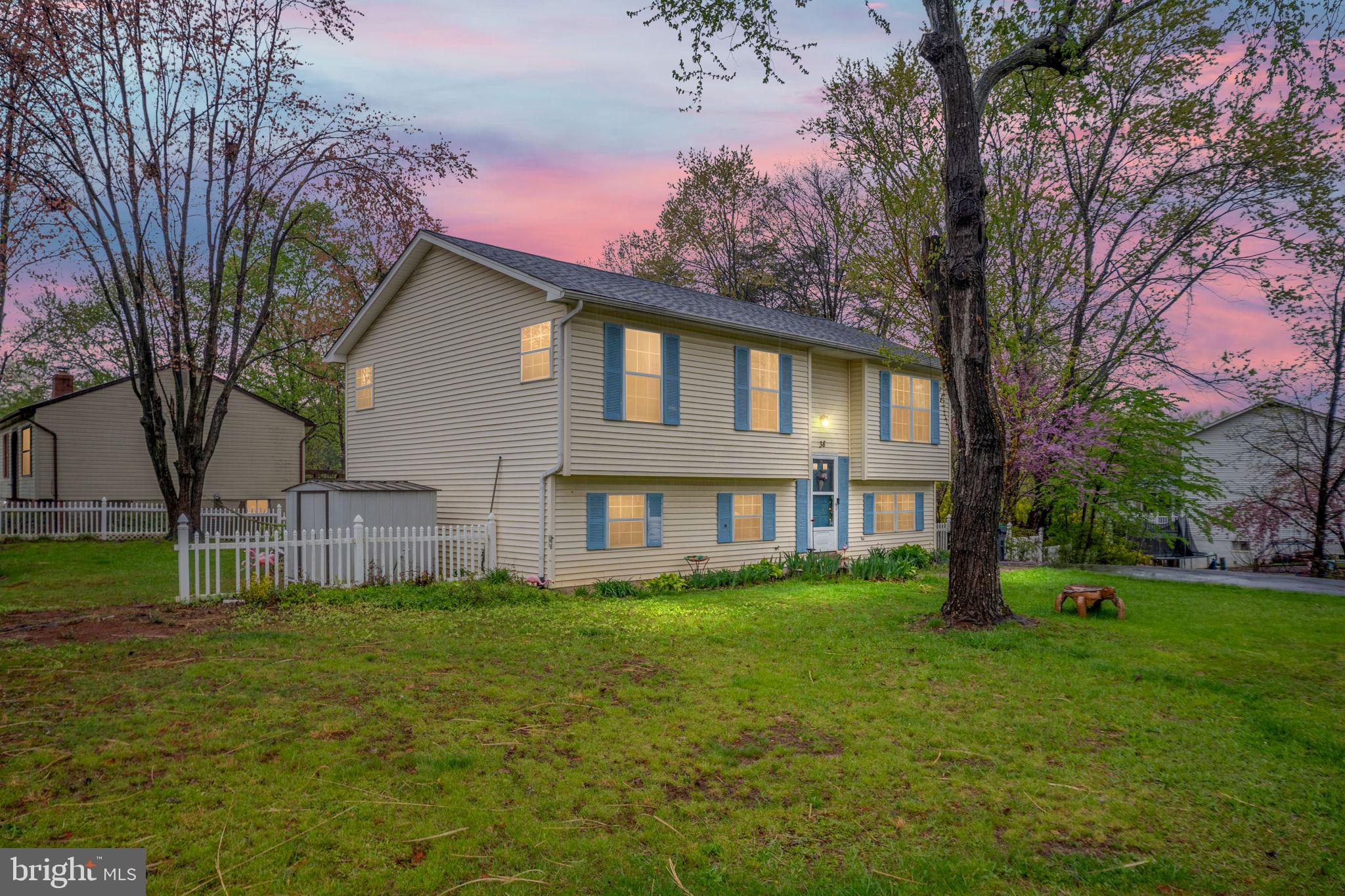 38 Buck Road Stafford, VA 22556 - Photo 2 of 39 a front view of a house with garden