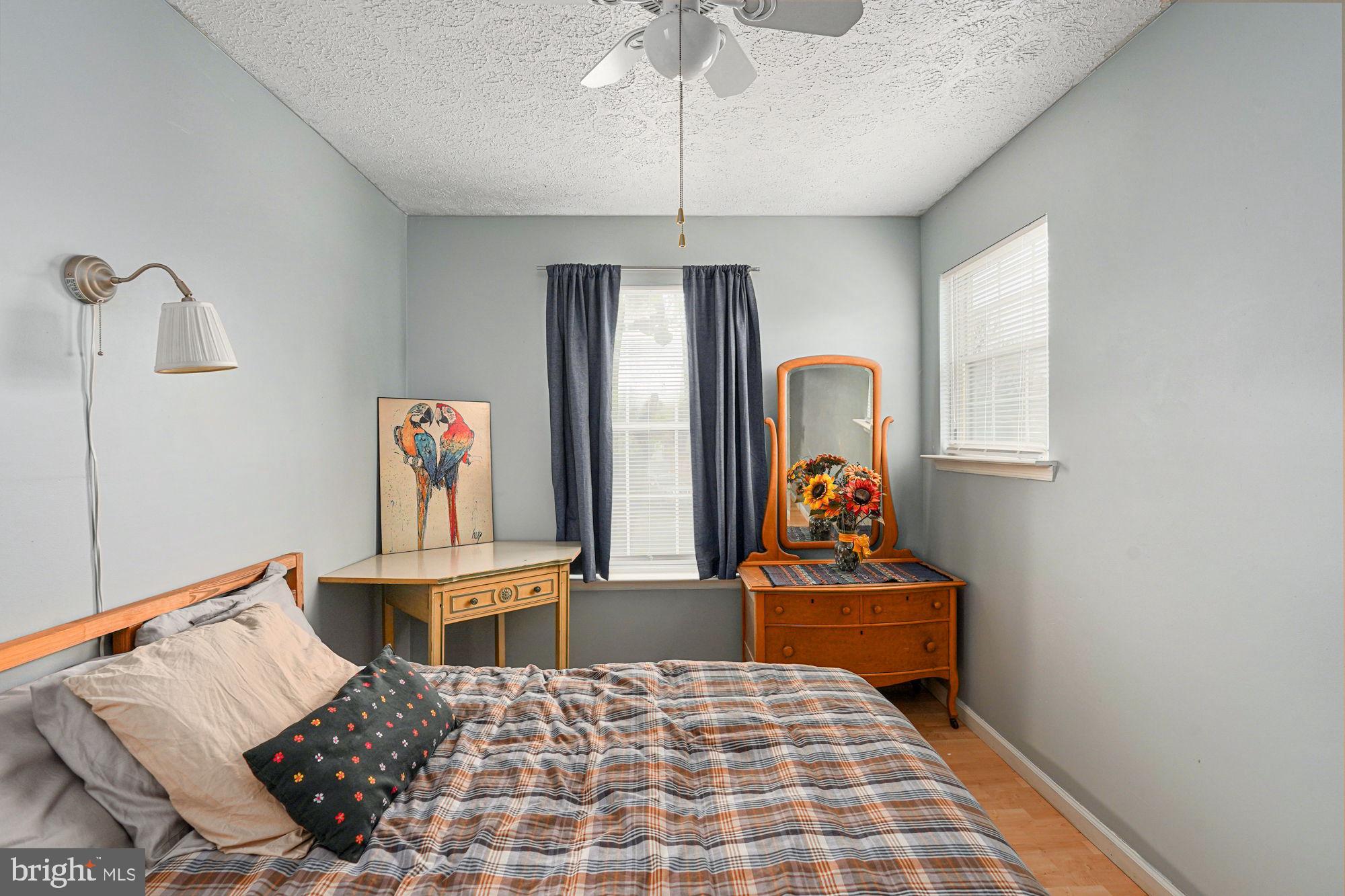 38 Buck Road Stafford, VA 22556 - Photo 21 of 39 a bedroom with a bed and a chandelier