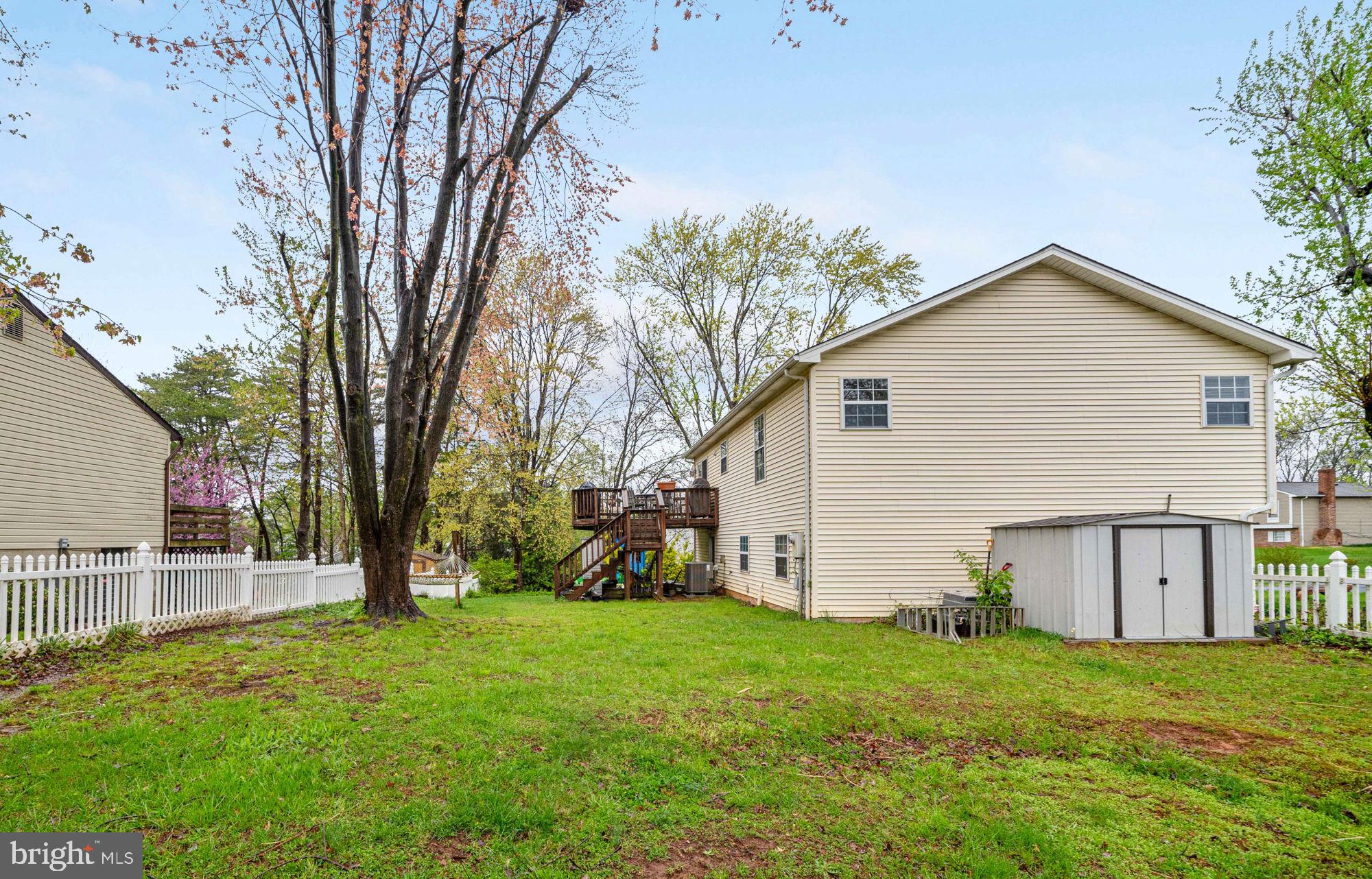 38 Buck Road Stafford, VA 22556 - Photo 31 of 39 a view of a backyard with a small cabin