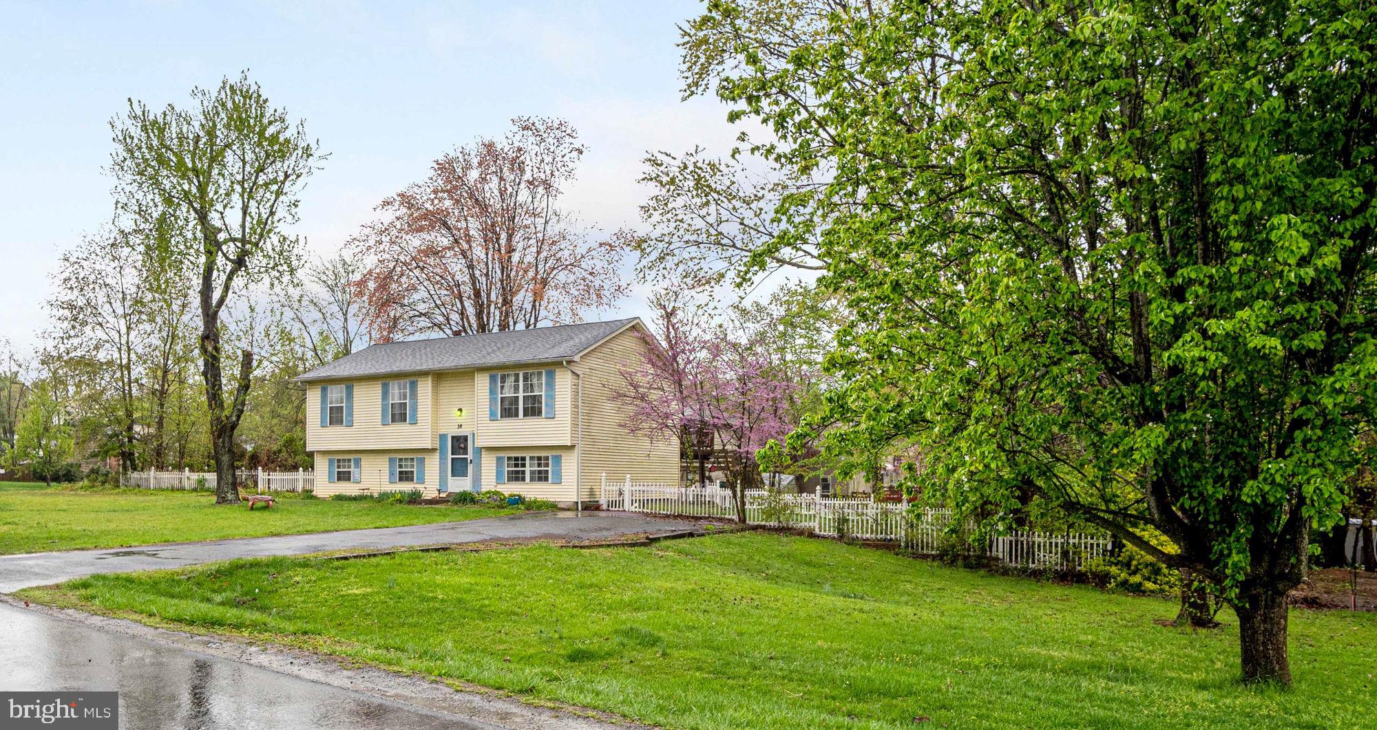 38 Buck Road Stafford, VA 22556 - Photo 36 of 39 a view of a house with a big yard plants and large trees