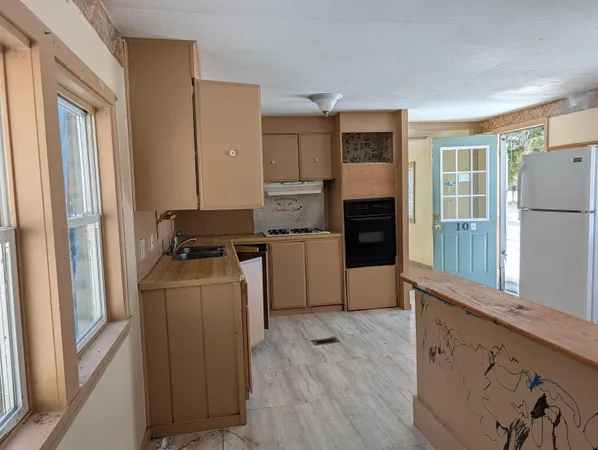 $230,000 | 10 Darren Drive, Raymond, NH 03077