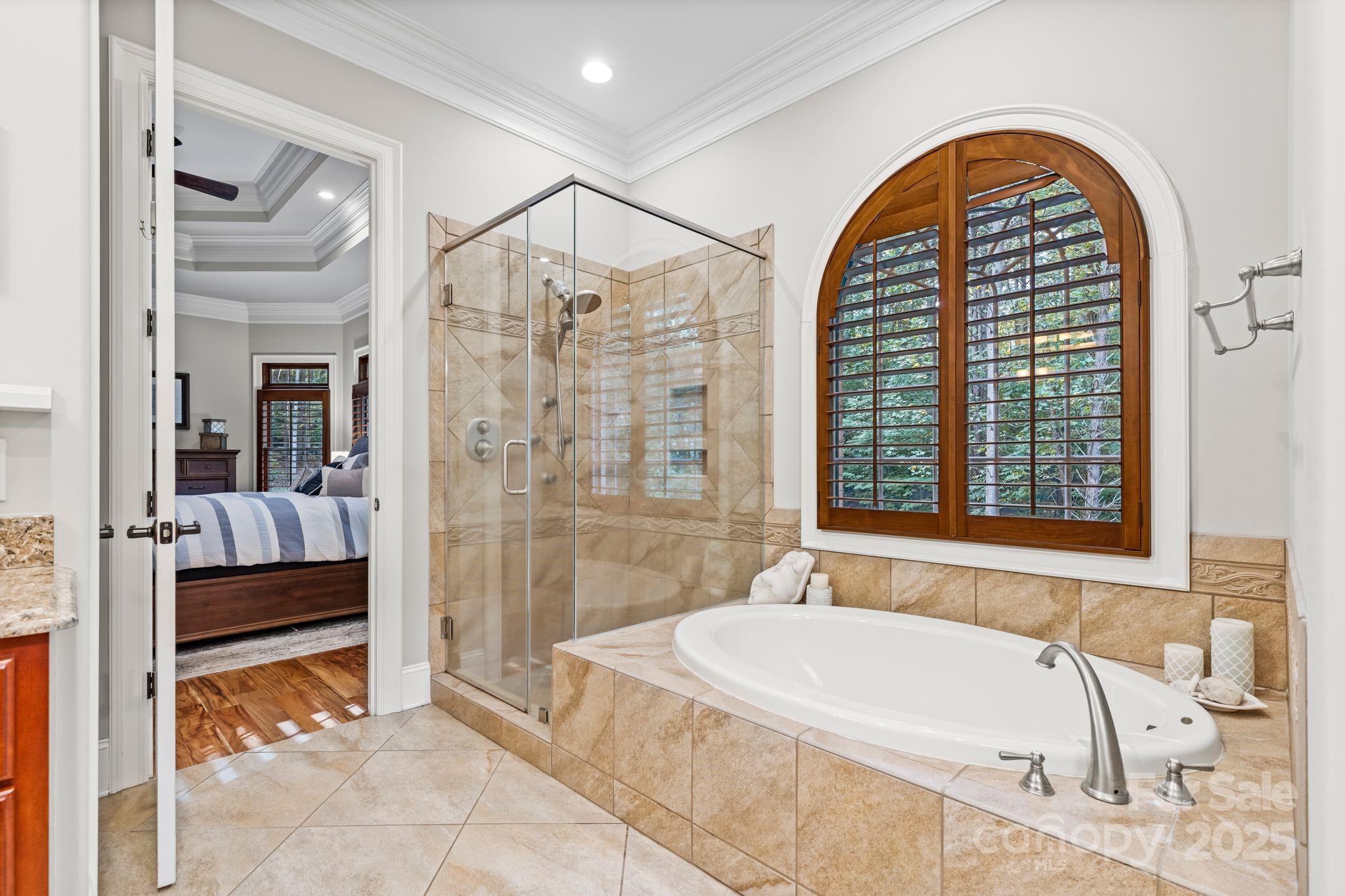 143 Greenbay Road Mooresville, NC 28117 - Photo 21 of 46 a spacious bathroom with a tub and shower