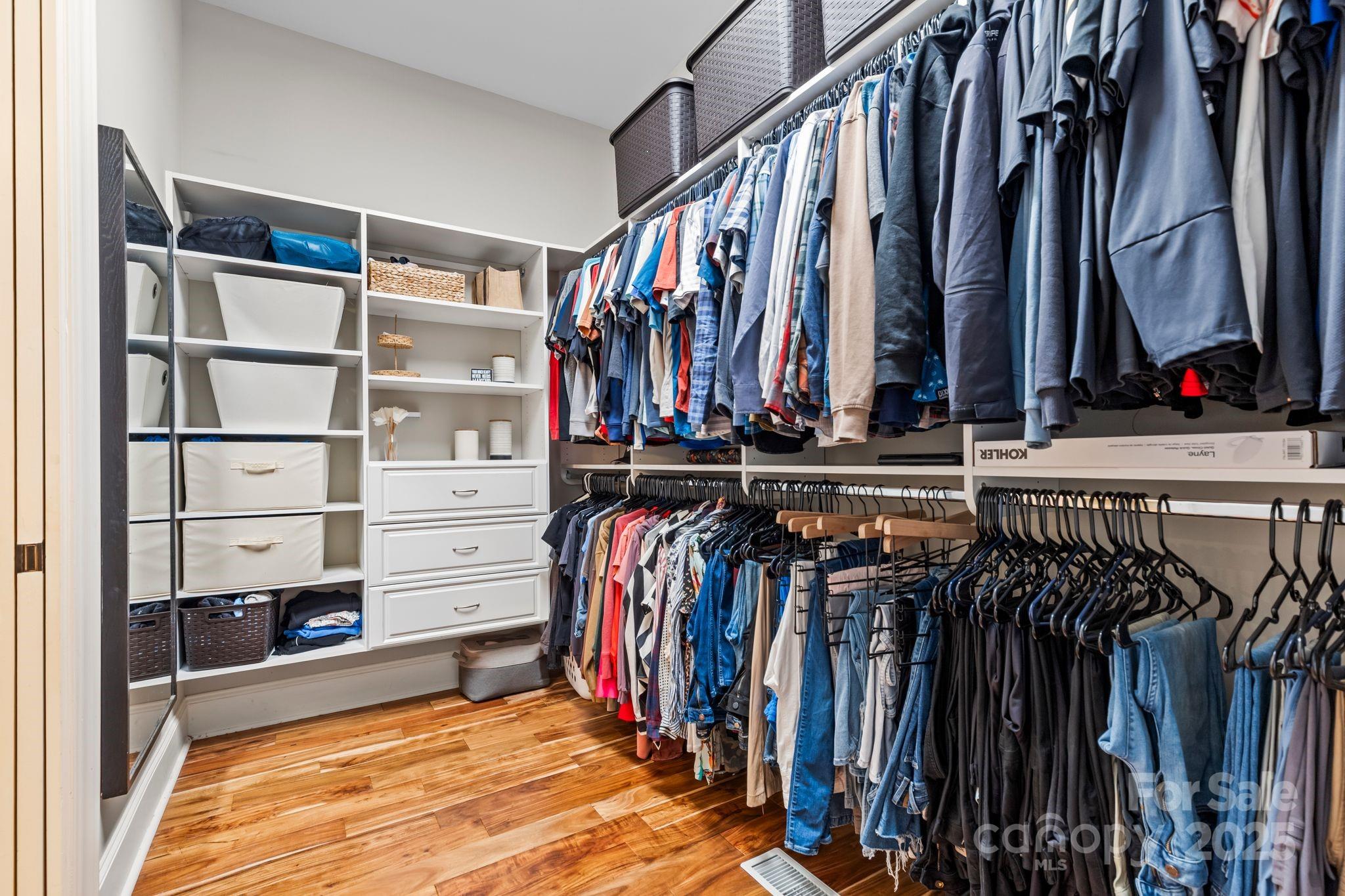 143 Greenbay Road Mooresville, NC 28117 - Photo 22 of 46 a view of walk in closet with clothes