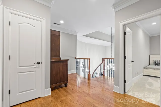 a view of entryway with wooden floor