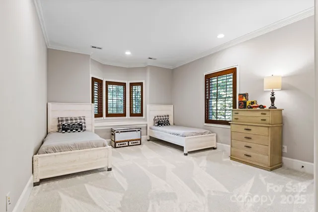 a bedroom with a bed and furniture