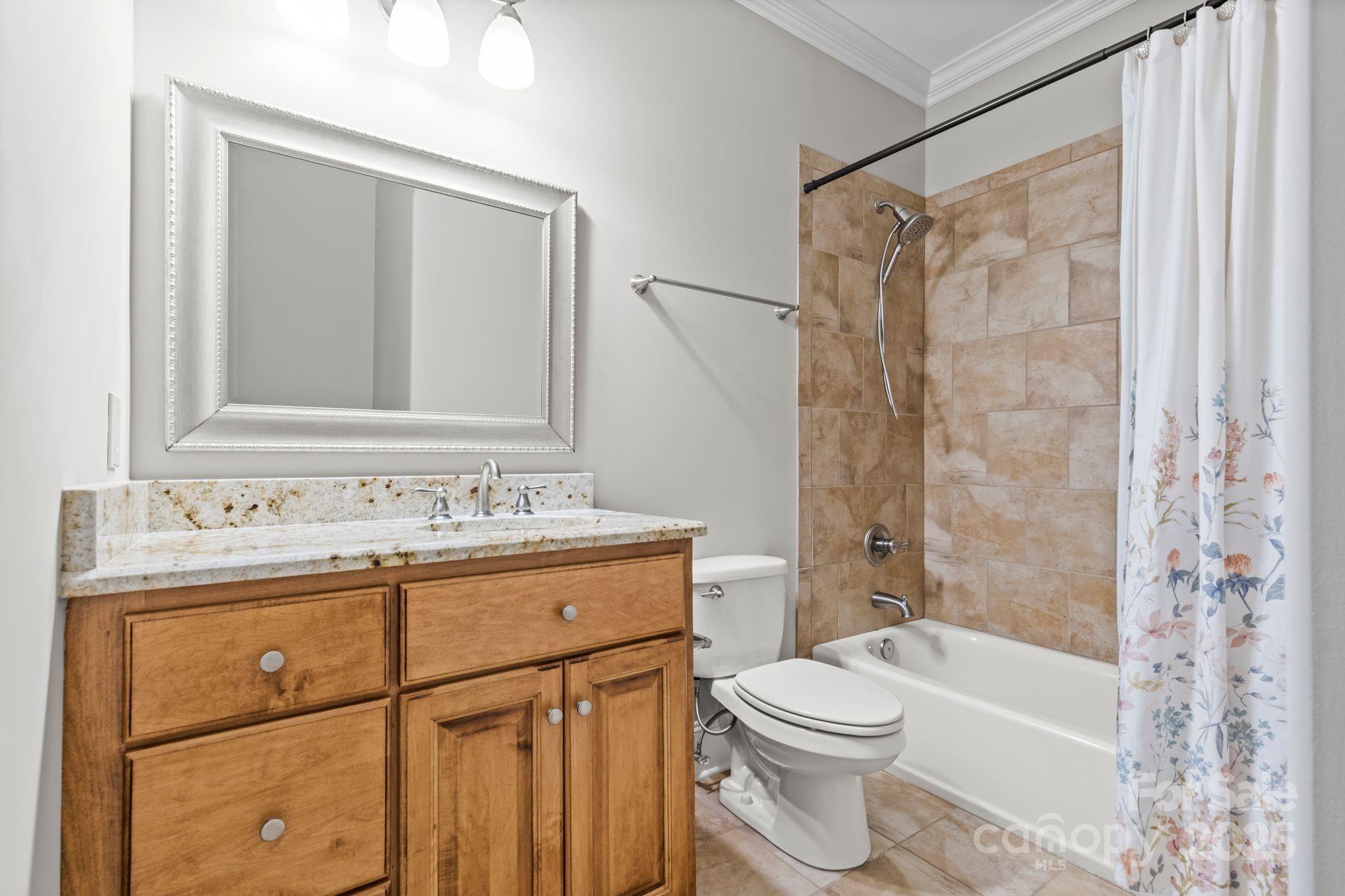 143 Greenbay Road Mooresville, NC 28117 - Photo 30 of 46 a bathroom with a sink a toilet and shower
