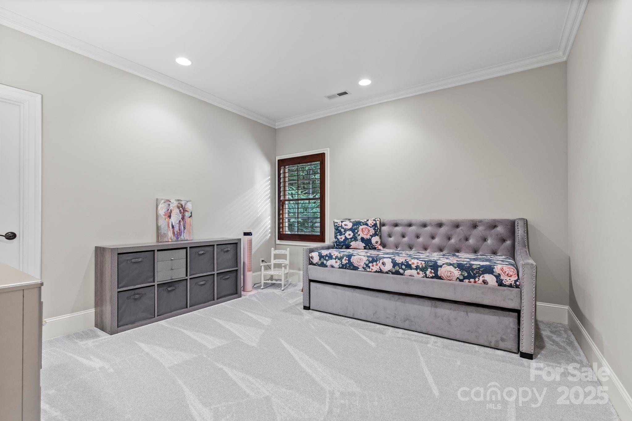 143 Greenbay Road Mooresville, NC 28117 - Photo 31 of 46 a bed room with a bed and a couch