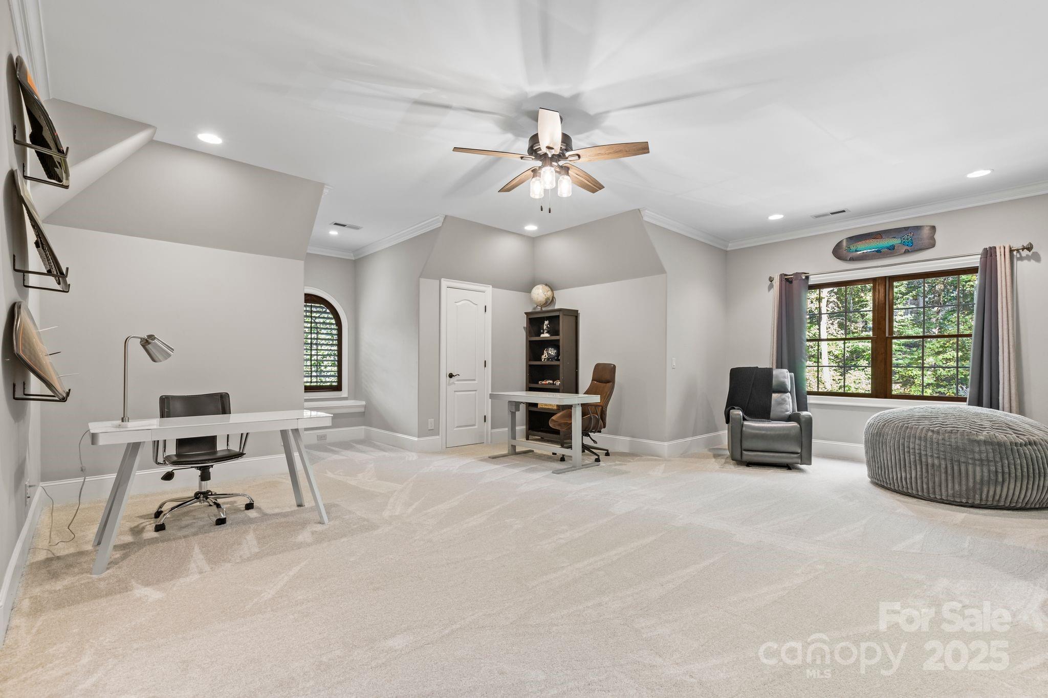 143 Greenbay Road Mooresville, NC 28117 - Photo 32 of 46 a living room with furniture and white walls