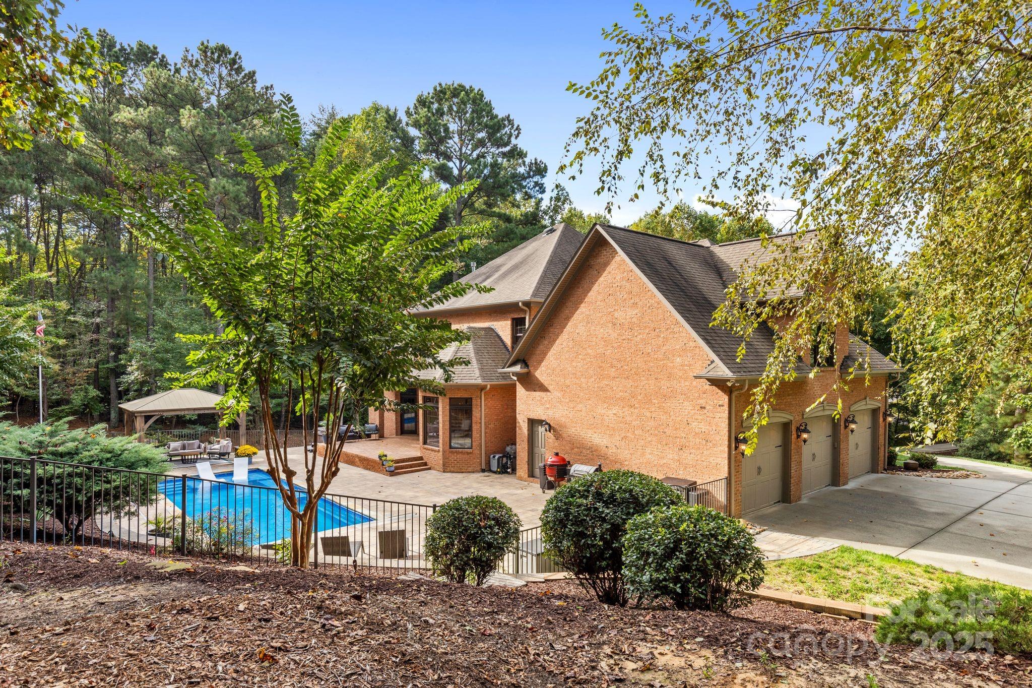 143 Greenbay Road Mooresville, NC 28117 - Photo 41 of 46 a view of a house with a yard