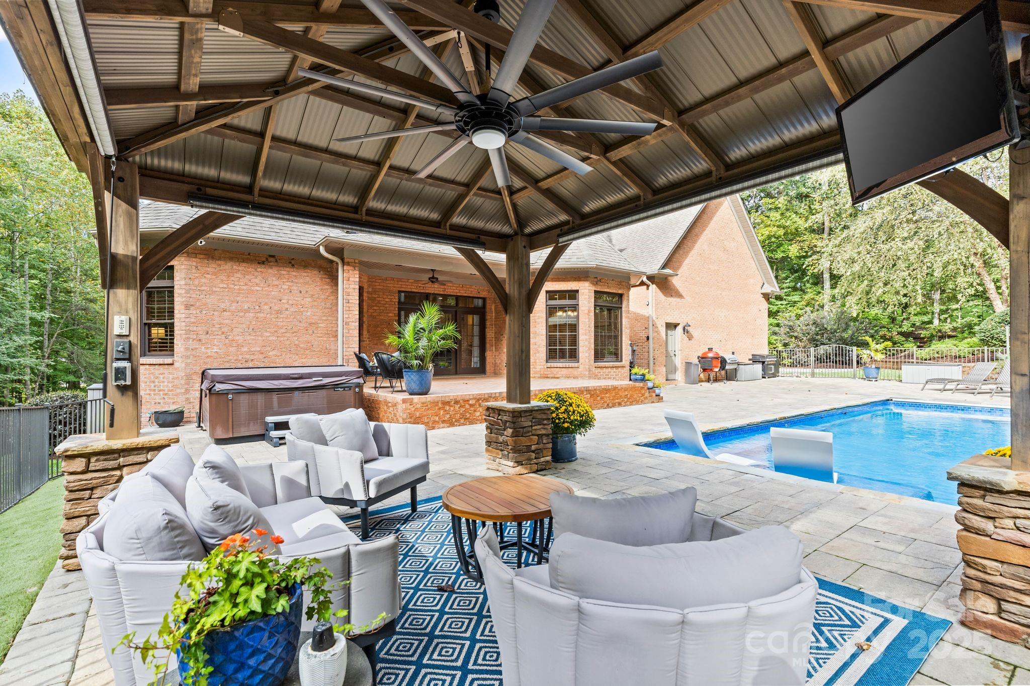 143 Greenbay Road Mooresville, NC 28117 - Photo 42 of 46 a outdoor living space with furniture and garden view