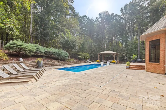 a view of a lounge chairs in the patio