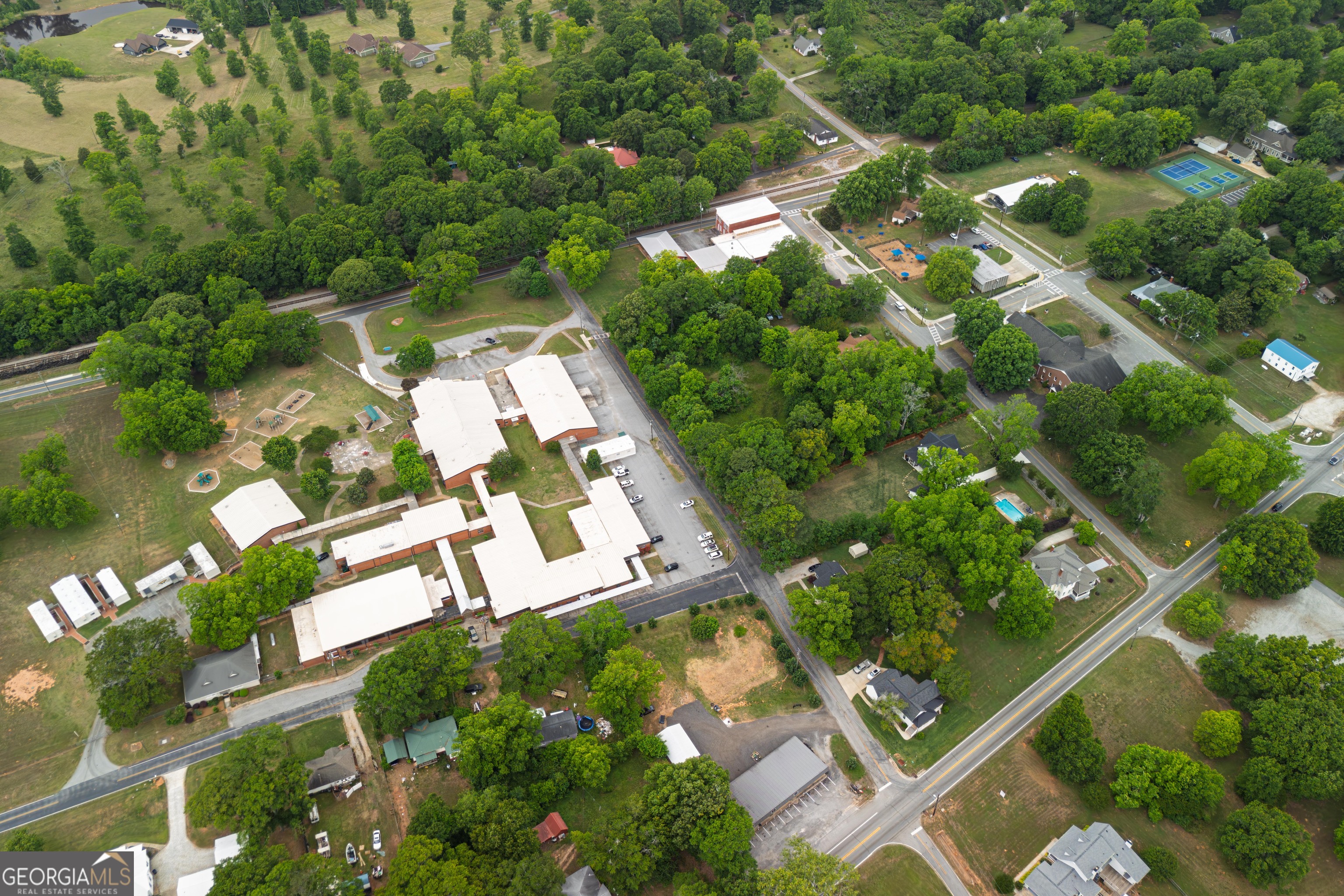 418 Lamb Road Moreland, GA 30259 - Photo 32 of 32 an aerial view of a residential houses with yard