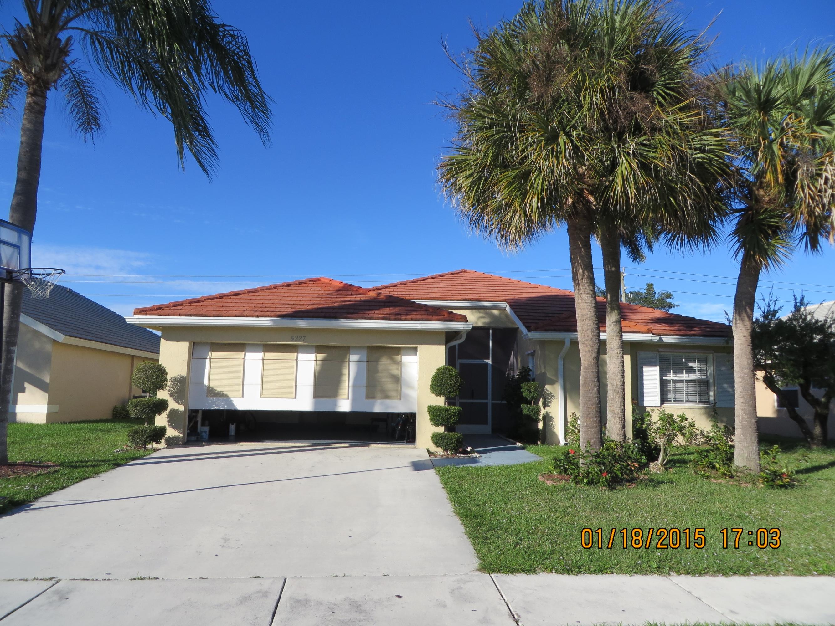 5227 Rosen Boulevard Boynton Beach, FL 33472 - Photo 2 of 53 2 front of home