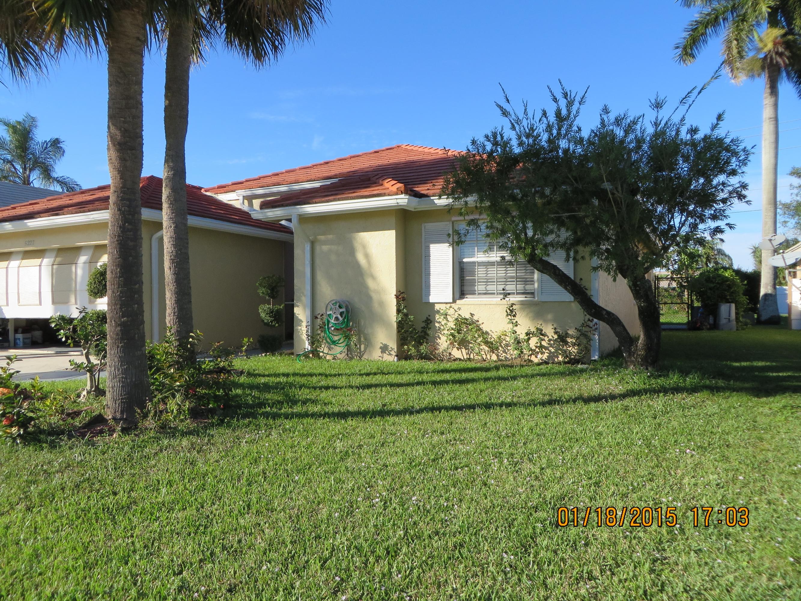 5227 Rosen Boulevard Boynton Beach, FL 33472 - Photo 4 of 53 4 other side front