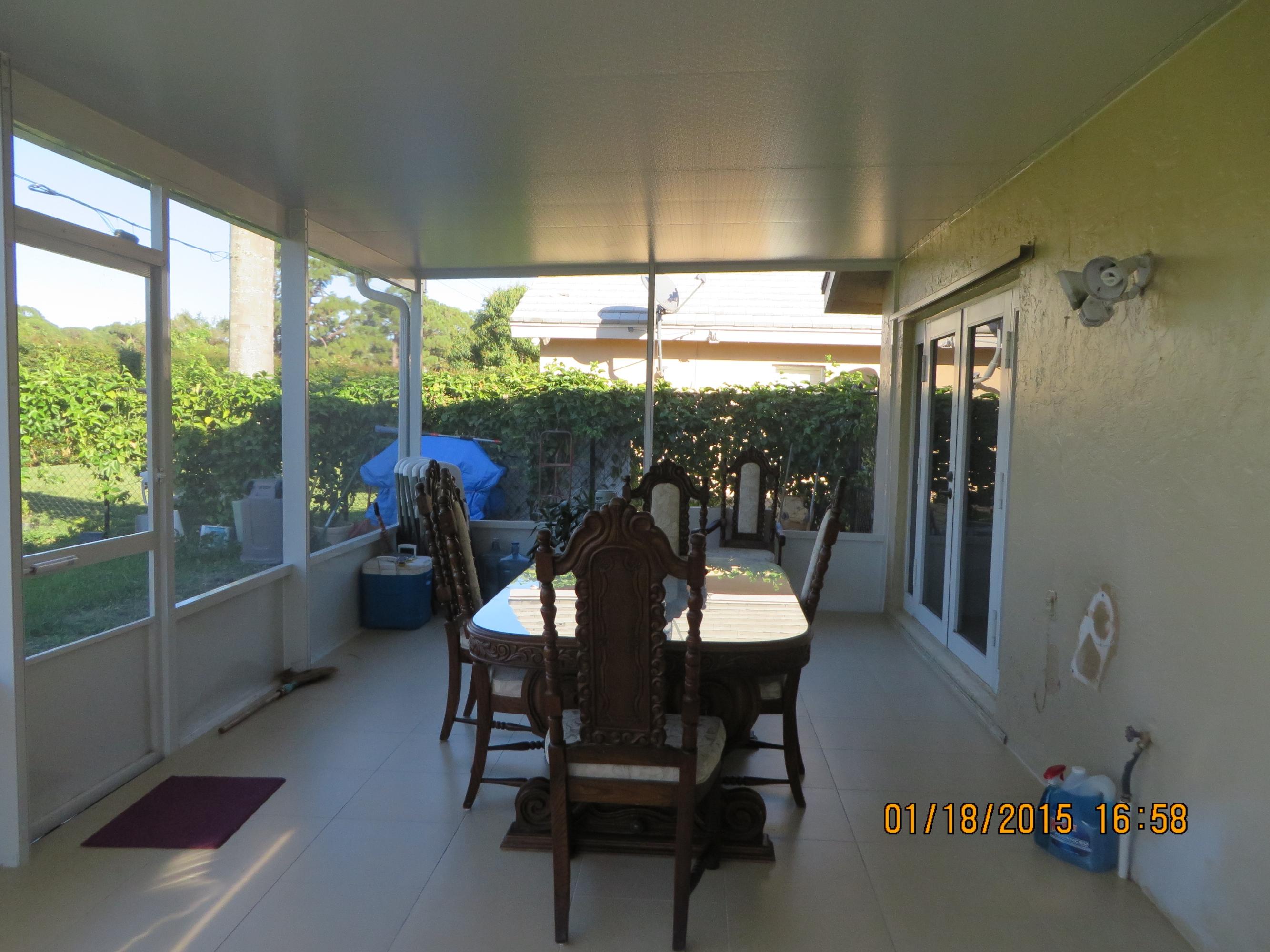 5227 Rosen Boulevard Boynton Beach, FL 33472 - Photo 44 of 53 47 Large covered tiled patio