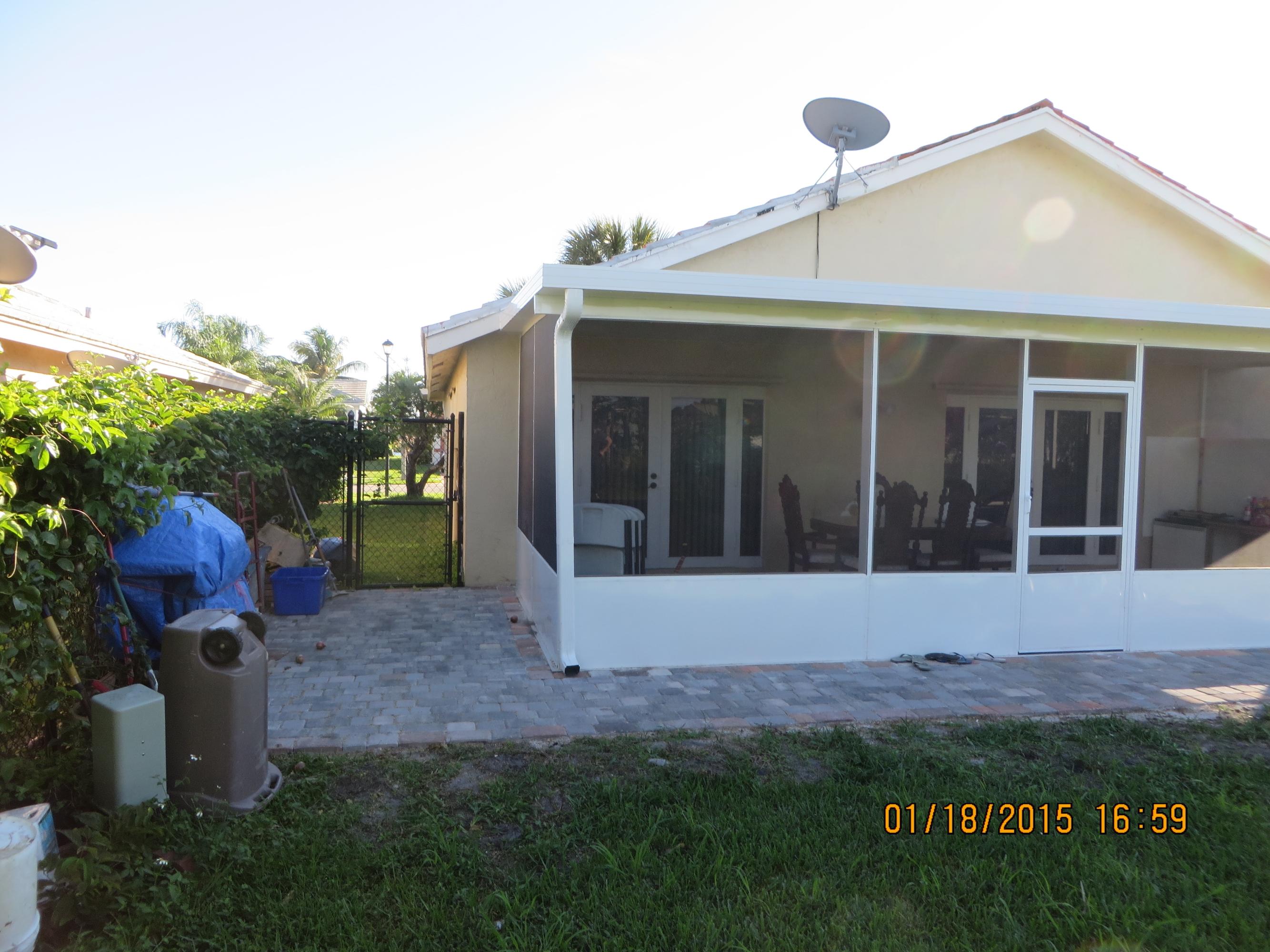 5227 Rosen Boulevard Boynton Beach, FL 33472 - Photo 47 of 53 pavers around patio