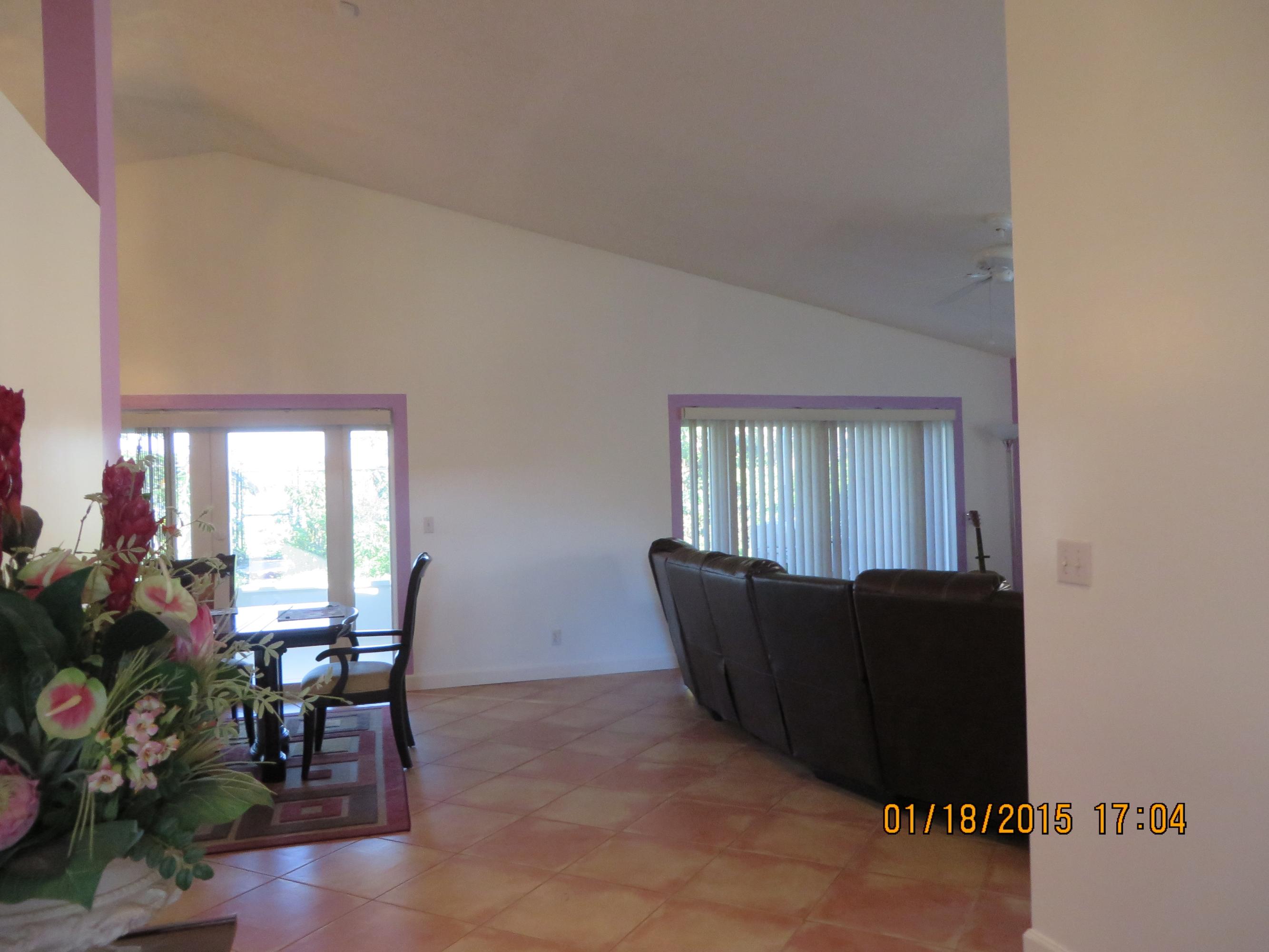5227 Rosen Boulevard Boynton Beach, FL 33472 - Photo 6 of 53 6 coming in front door to living area