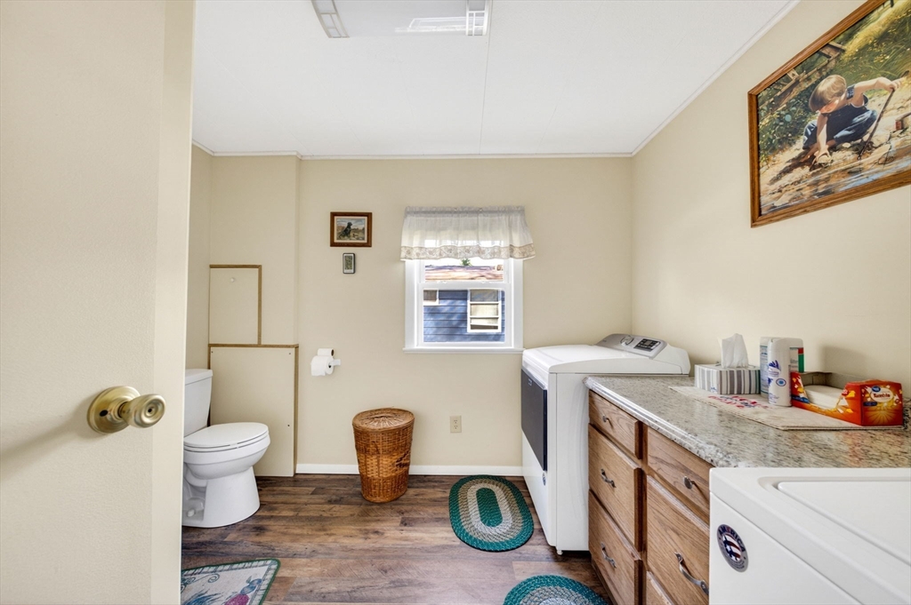 19 Timber Lane Wareham, MA 02571 - Photo 17 of 38 a bathroom with a sink mirror vanity and toilet
