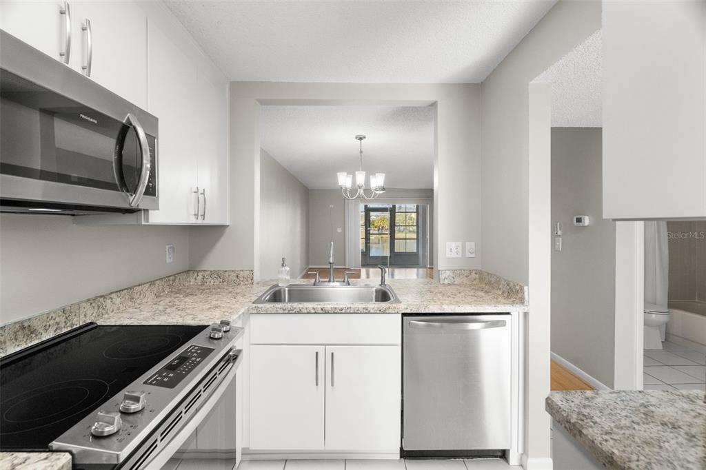 1438 Millstream Lane, Unit 102 Dunedin, FL 34698 - Photo 4 of 28