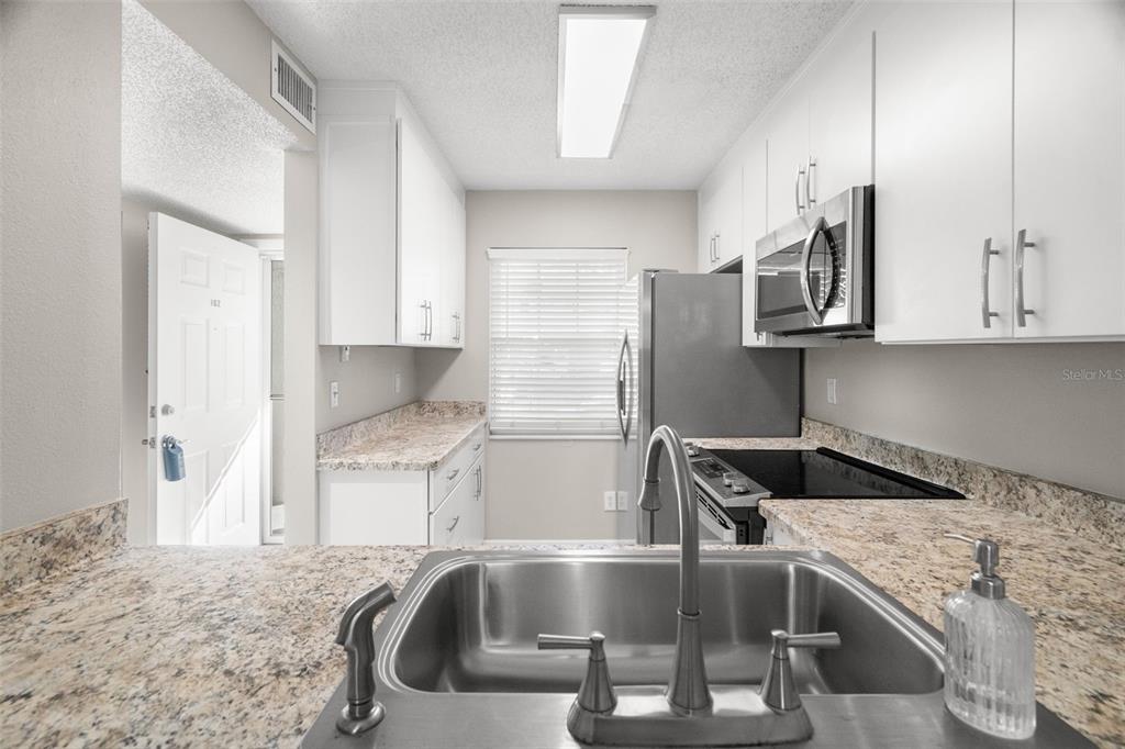 1438 Millstream Lane, Unit 102 Dunedin, FL 34698 - Photo 6 of 28