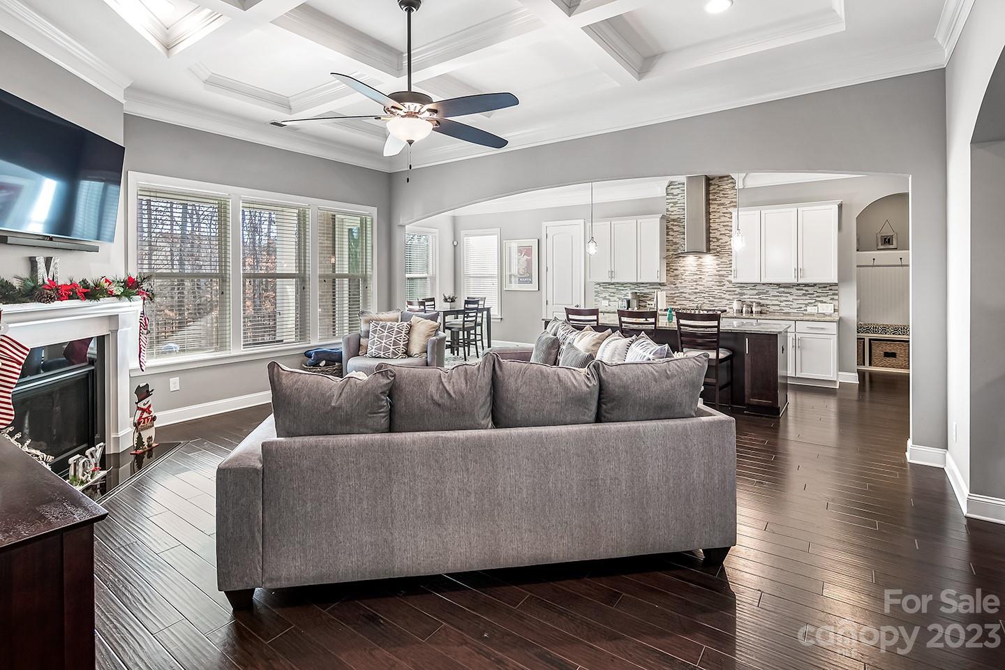 6004 Tremont Drive Indian Trail, NC 28079 - Photo 11 of 40 a living room with furniture kitchen and a fireplace