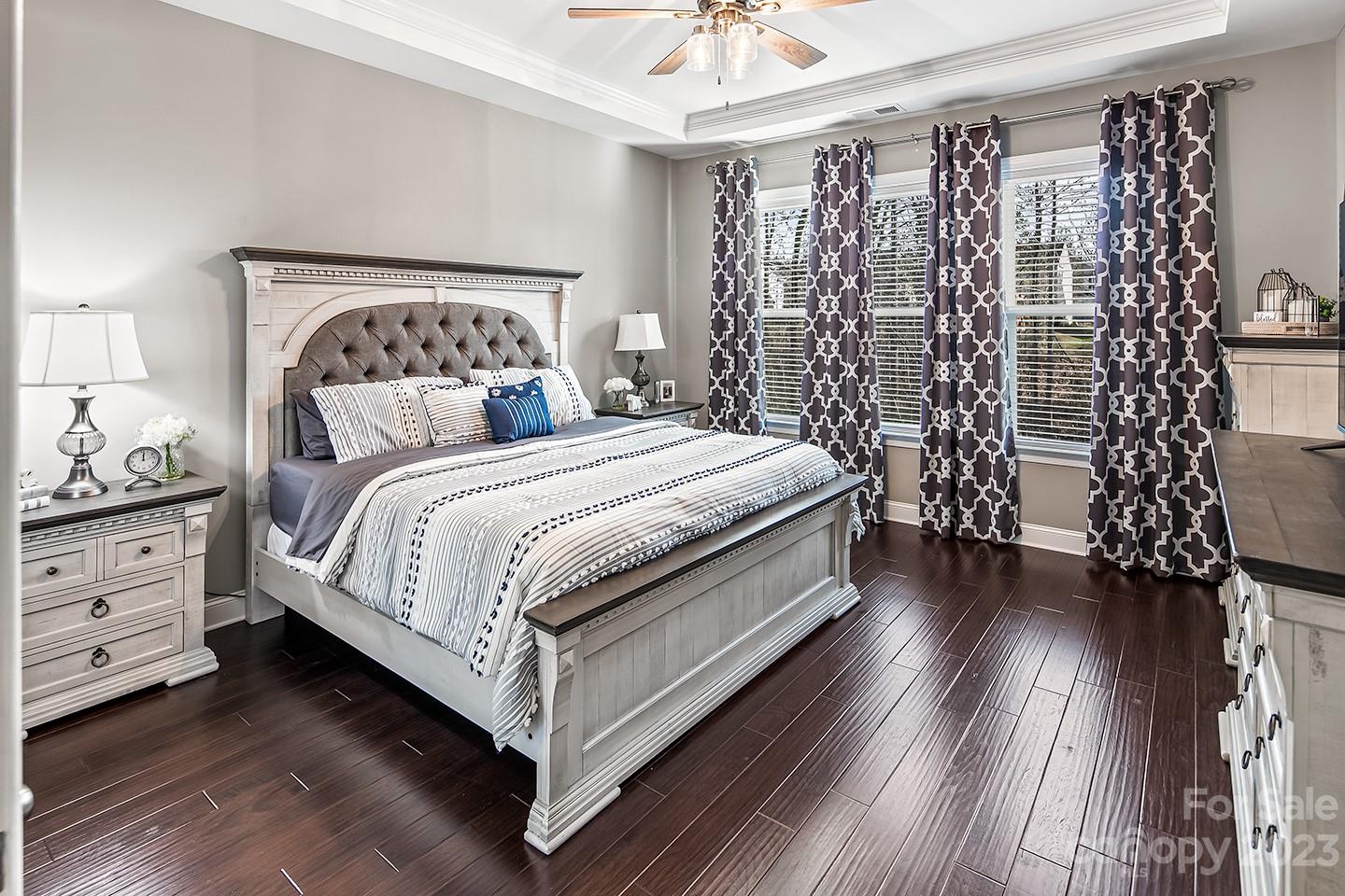 6004 Tremont Drive Indian Trail, NC 28079 - Photo 20 of 40 a bedroom with a bed and a chair