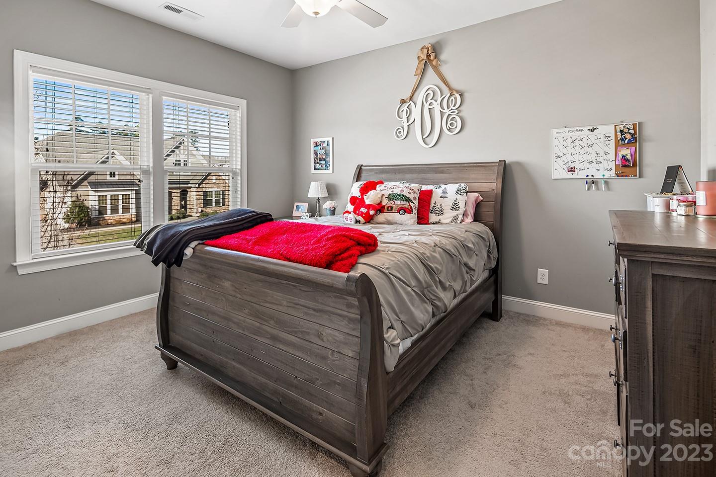 6004 Tremont Drive Indian Trail, NC 28079 - Photo 31 of 40 a bedroom with a bed and window