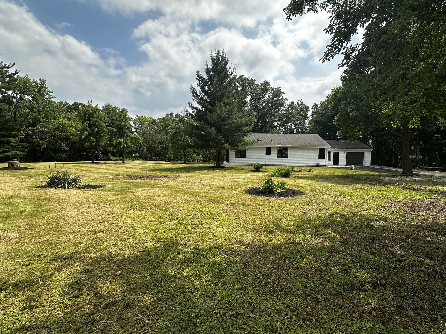2212 North 2829th Road Marseilles, IL 61341 - Photo 1 of 44 a view of a swimming pool with an outdoor seating