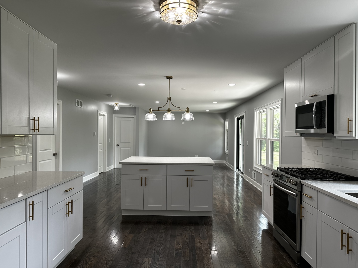 2212 North 2829th Road Marseilles, IL 61341 - Photo 11 of 44 a bathroom with a sink a large mirror and a shower