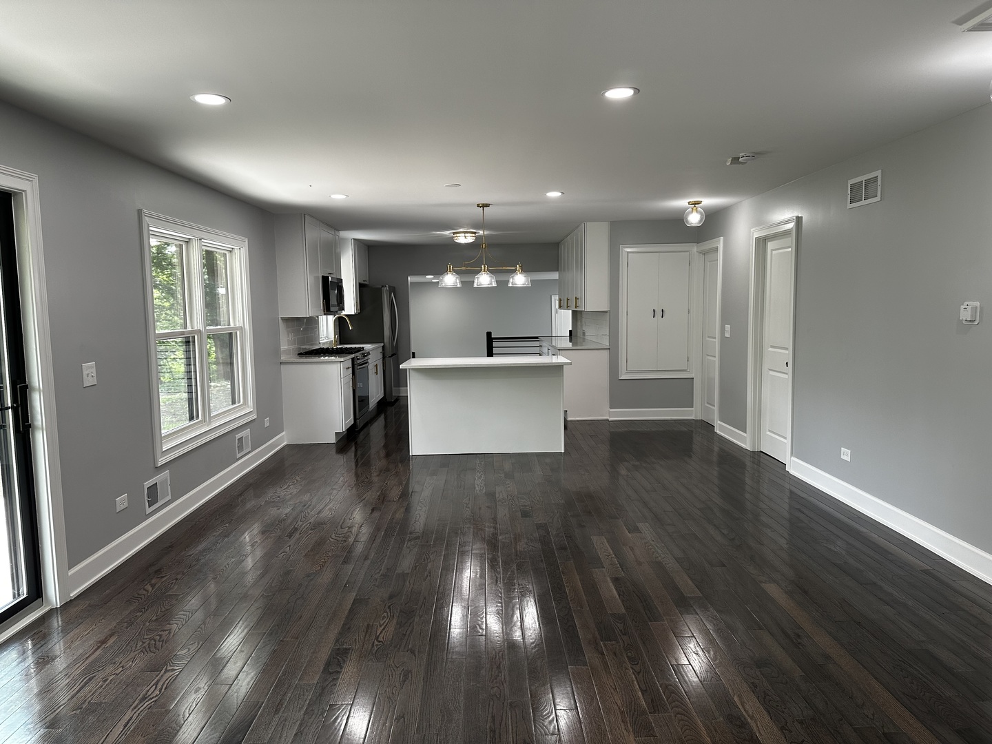 2212 North 2829th Road Marseilles, IL 61341 - Photo 14 of 44 a view of a kitchen with wooden floor and a window