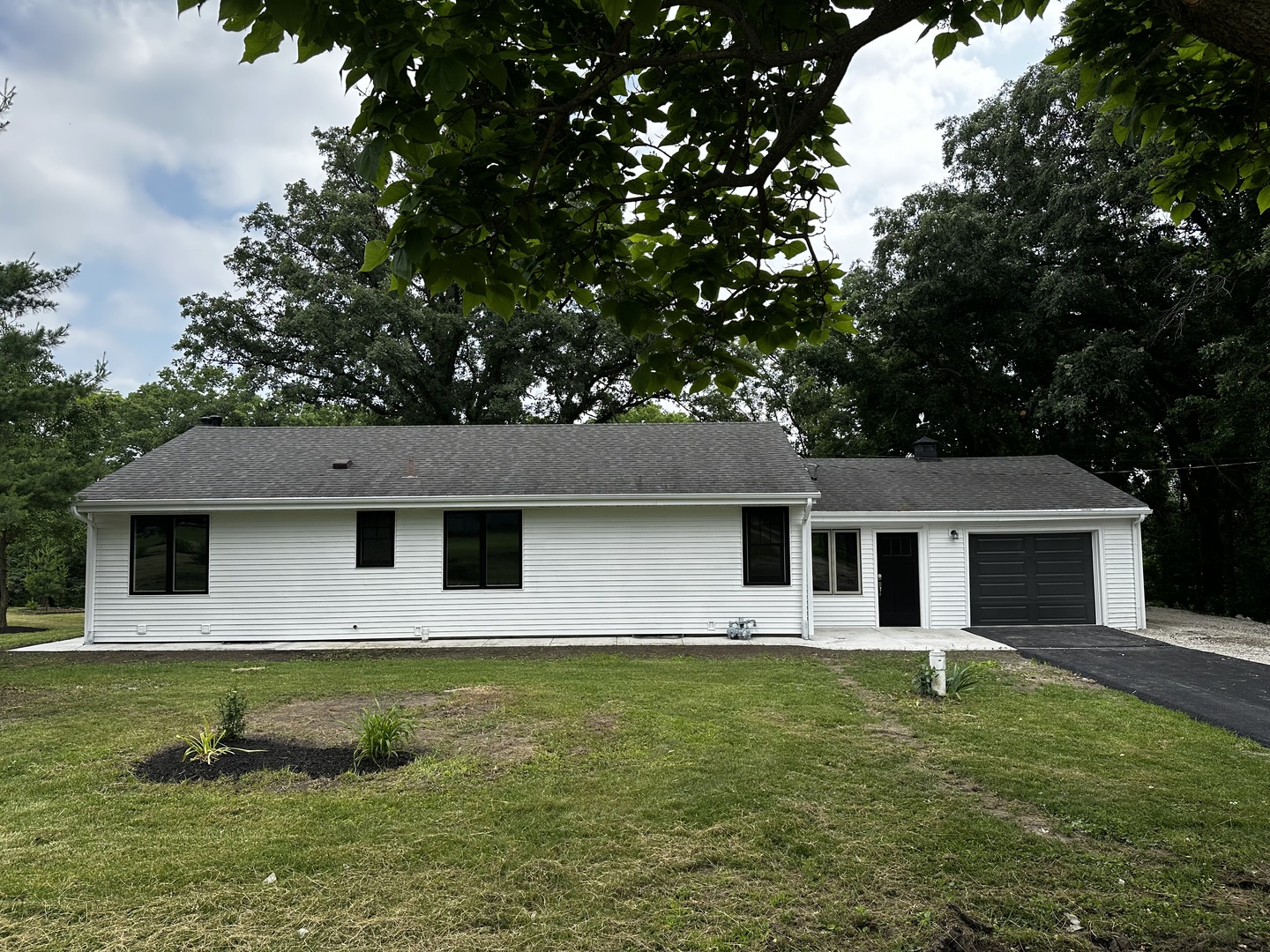 2212 North 2829th Road Marseilles, IL 61341 - Photo 2 of 44 a front view of house with yard