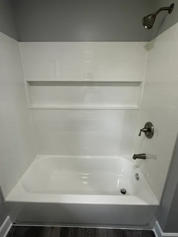 a bathroom with a bathtub