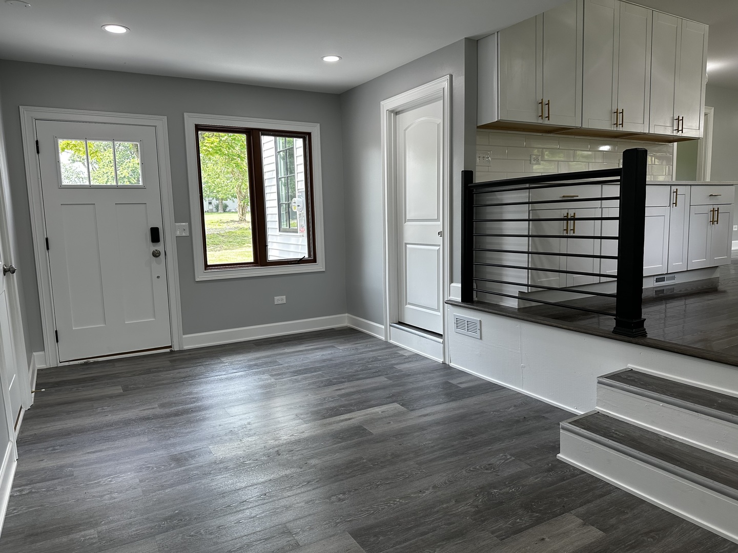 2212 North 2829th Road Marseilles, IL 61341 - Photo 7 of 44 a view of an empty room with wooden floor and a window