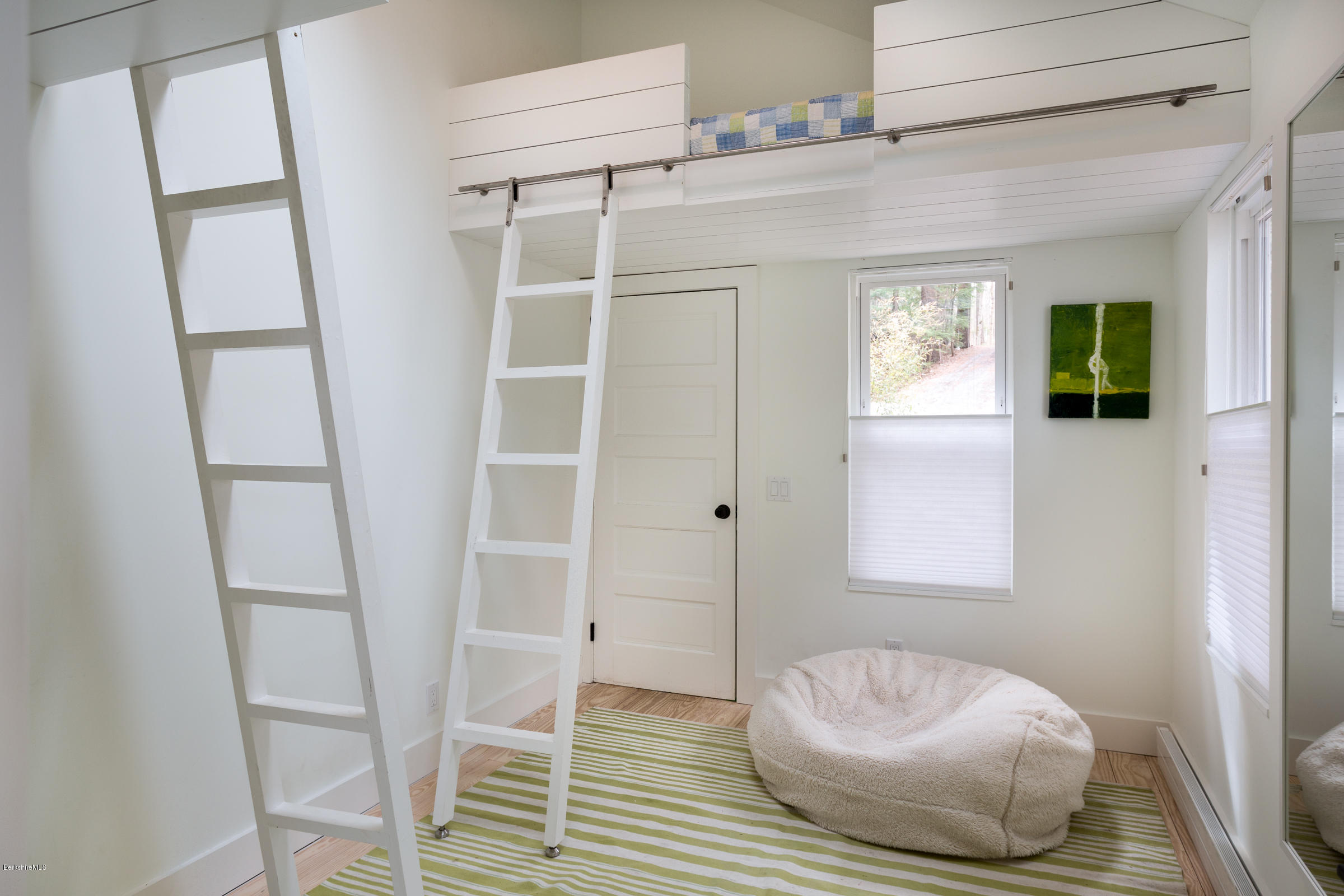 28 Bidwell Road Monterey, MA 01245 - Photo 14 of 28 a bedroom with a bed and a window