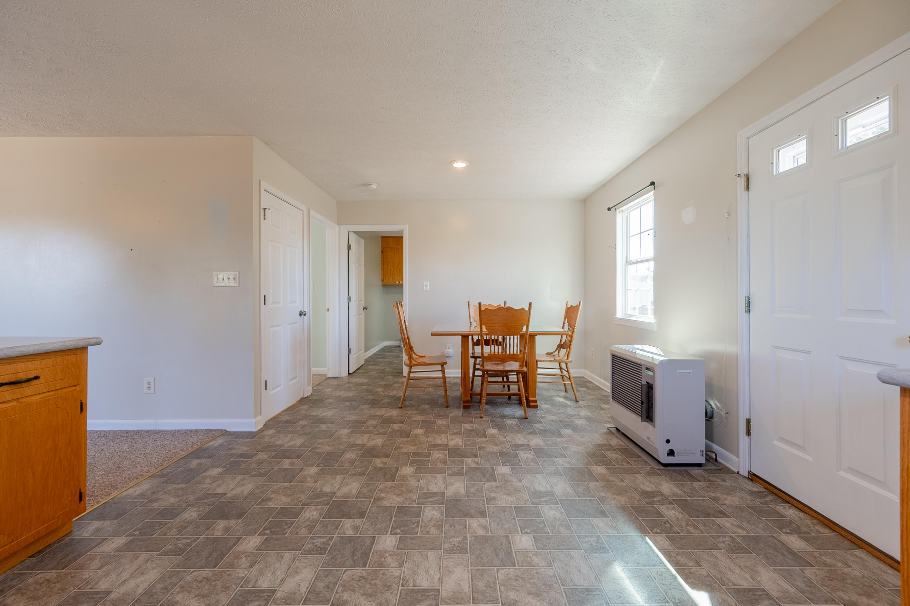 2448 Kyle Weeks Road Southwest Willis, VA 24380 - Photo 20 of 65 a view of a room with furniture and windows