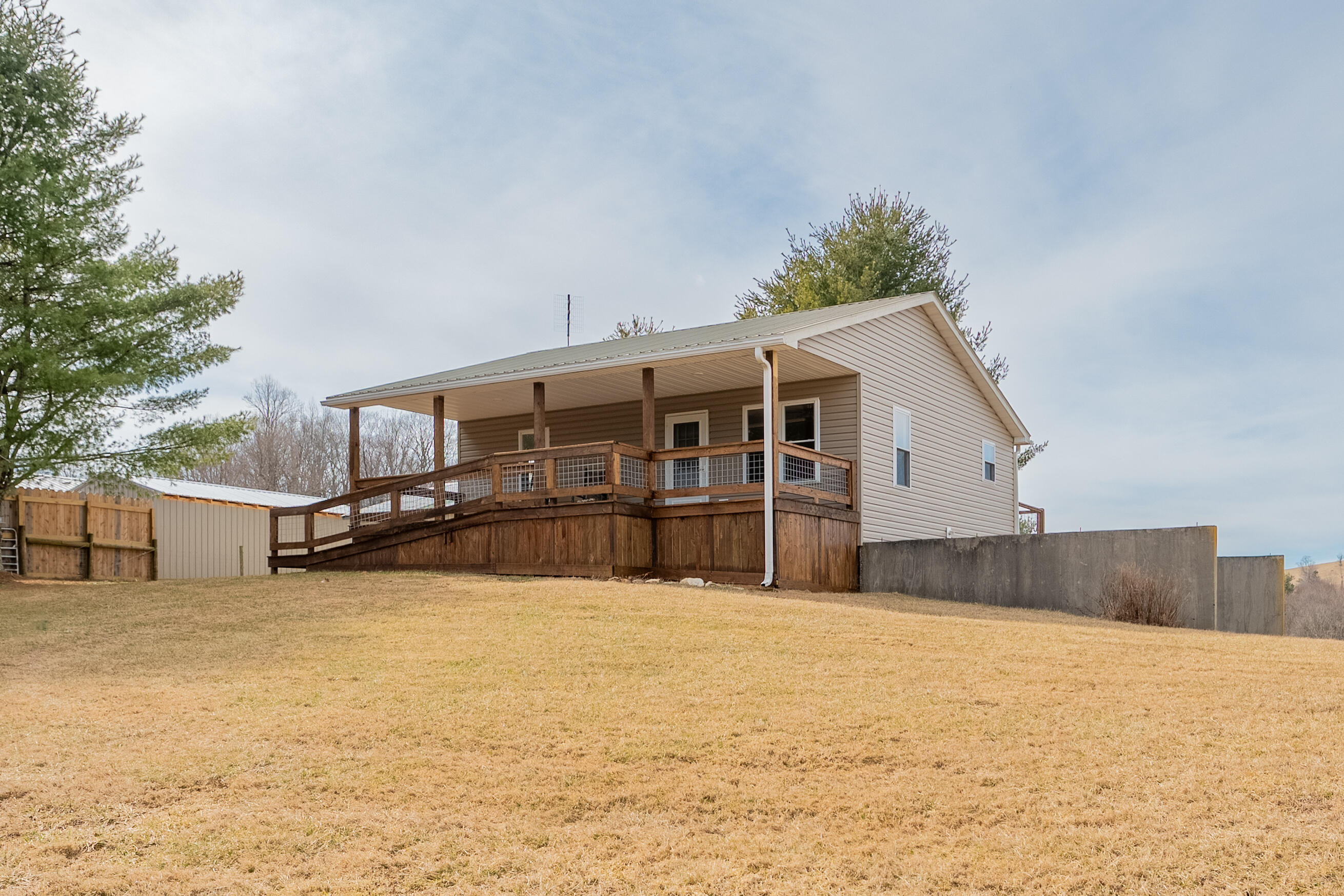 2448 Kyle Weeks Road Southwest Willis, VA 24380 - Photo 2 of 65 a view of a house with a yard