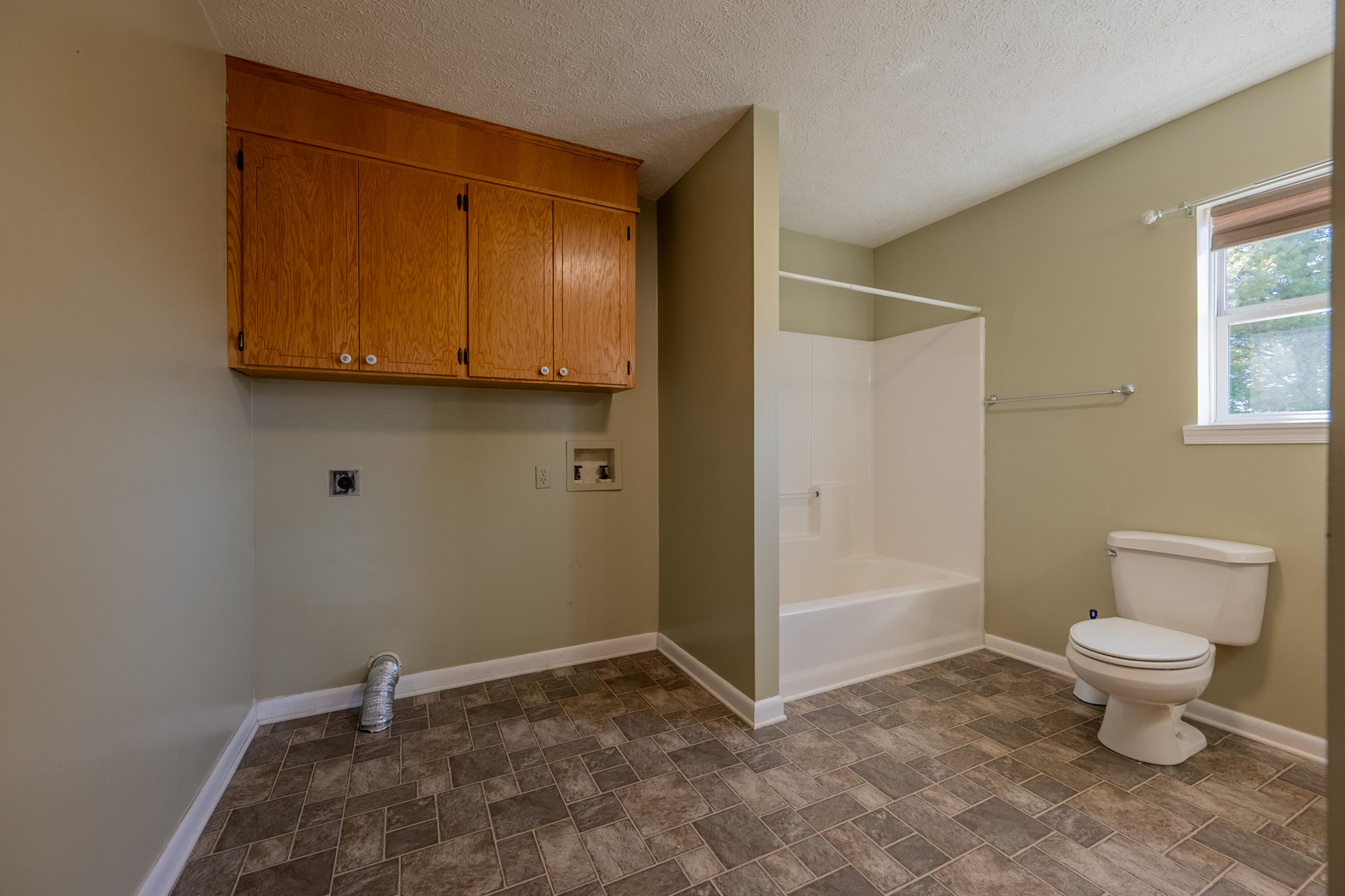 2448 Kyle Weeks Road Southwest Willis, VA 24380 - Photo 23 of 65 a view of bathroom with toilet