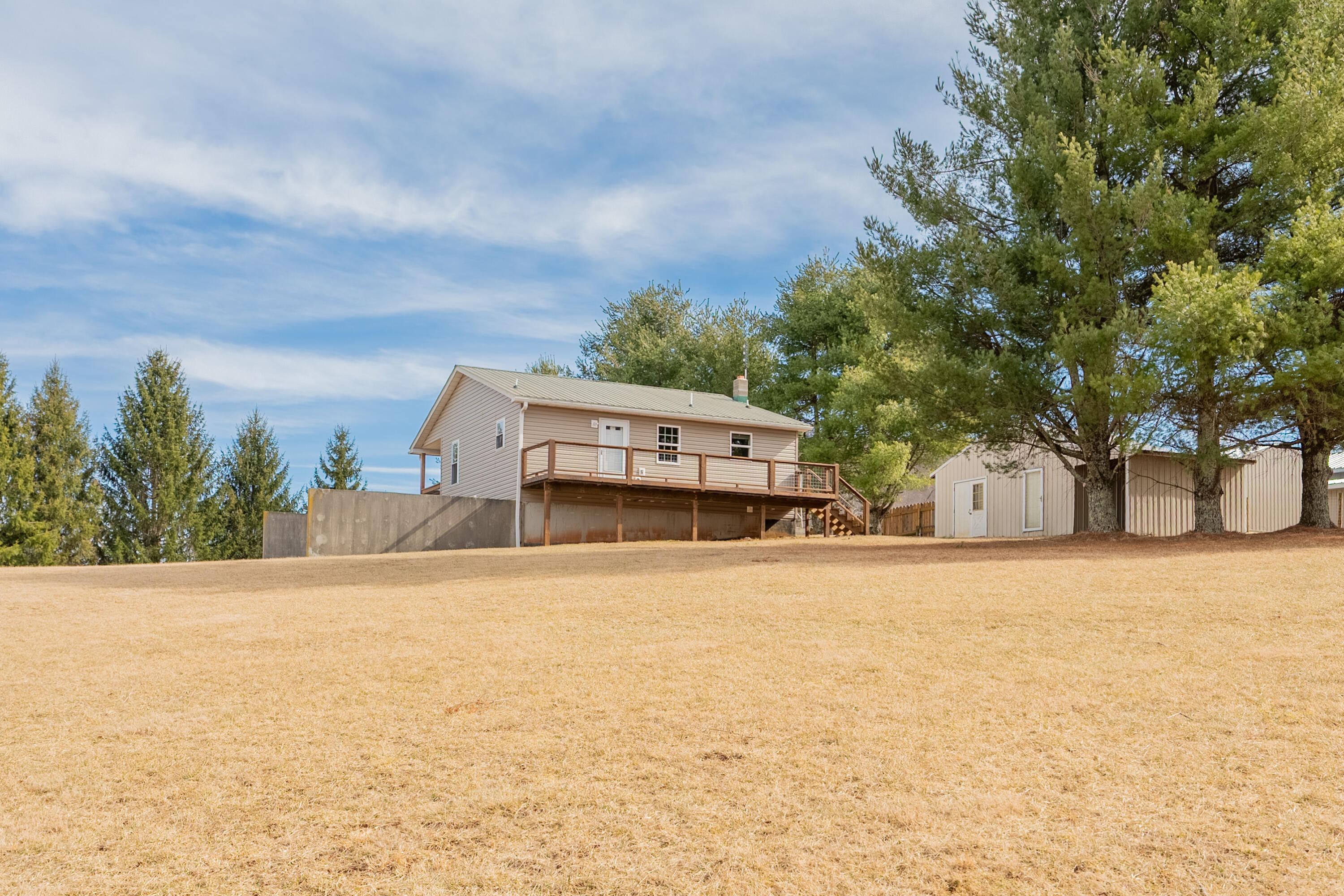 2448 Kyle Weeks Road Southwest Willis, VA 24380 - Photo 53 of 65 a view of a house with a yard