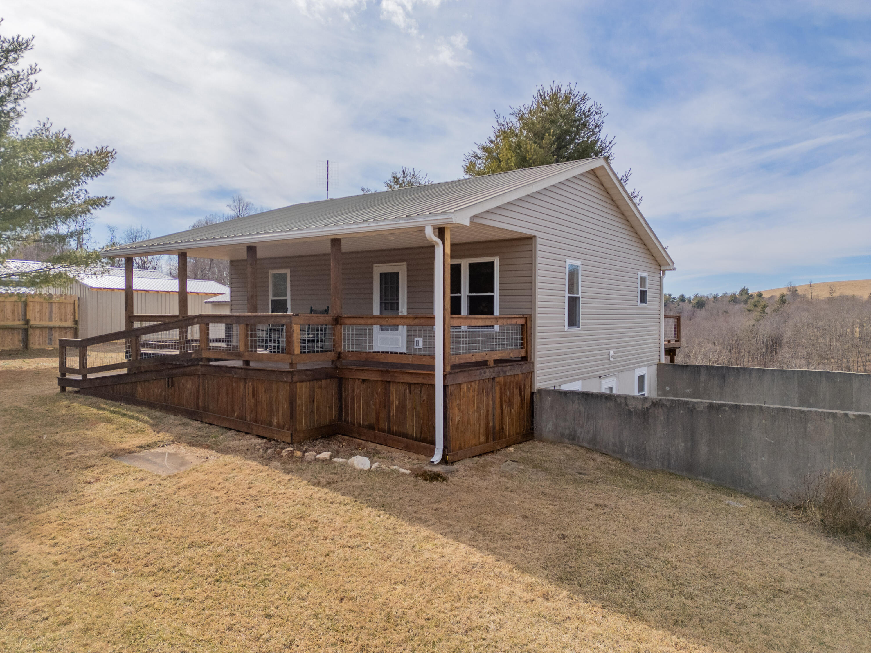 2448 Kyle Weeks Road Southwest Willis, VA 24380 - Photo 60 of 65 a view of a house with a yard