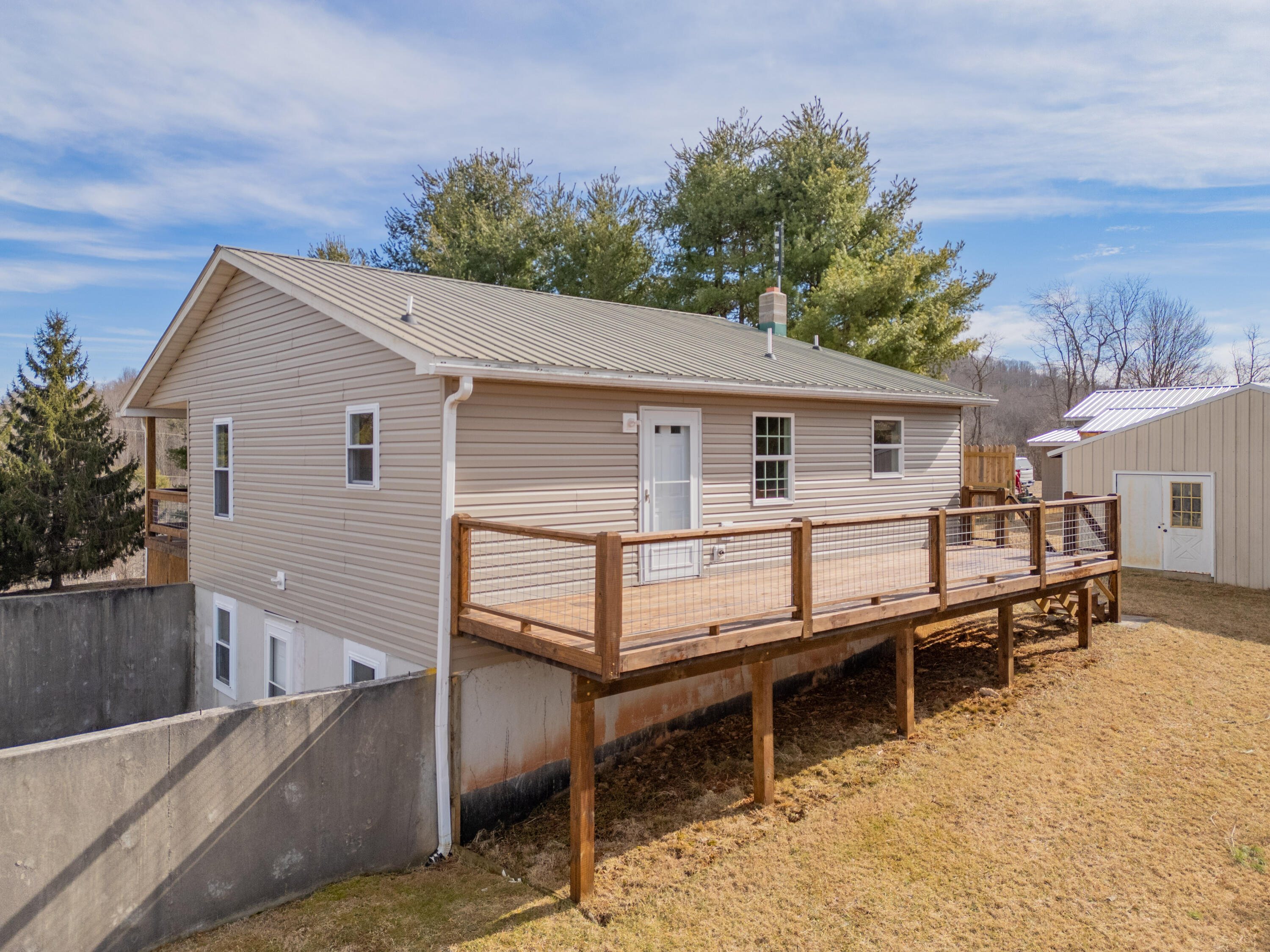 2448 Kyle Weeks Road Southwest Willis, VA 24380 - Photo 63 of 65 a view of a house with wooden fence