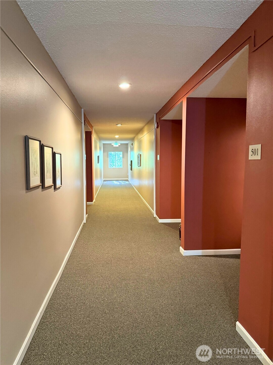 7600 Southeast 29th Street, Unit 501 Mercer Island, WA 98040 - Photo 19 of 21 a view of a livingroom with an empty space and a window