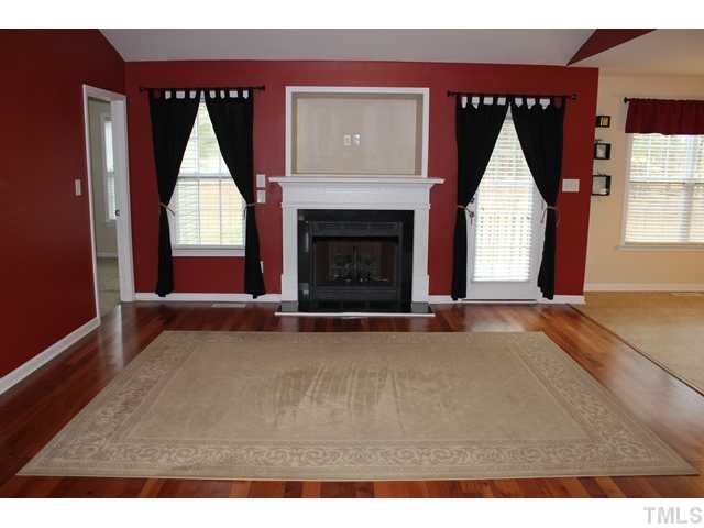 407 Ridge Road Angier, NC 27501 - Photo 3 of 25 Come on in and see the beautiful hardwood floors in your HUGE family room and hallways!