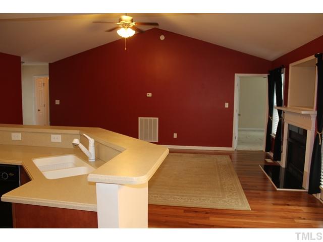 407 Ridge Road Angier, NC 27501 - Photo 7 of 25 Another view of the kitchen into the family room.