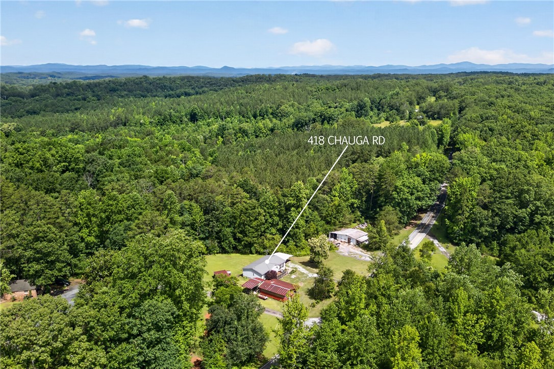 418 Chauga Road Westminster, SC 29693 - Photo 32 of 38 Perched atop a verdant landscape, this property offers commanding views of surrounding hills and dense woodlands.